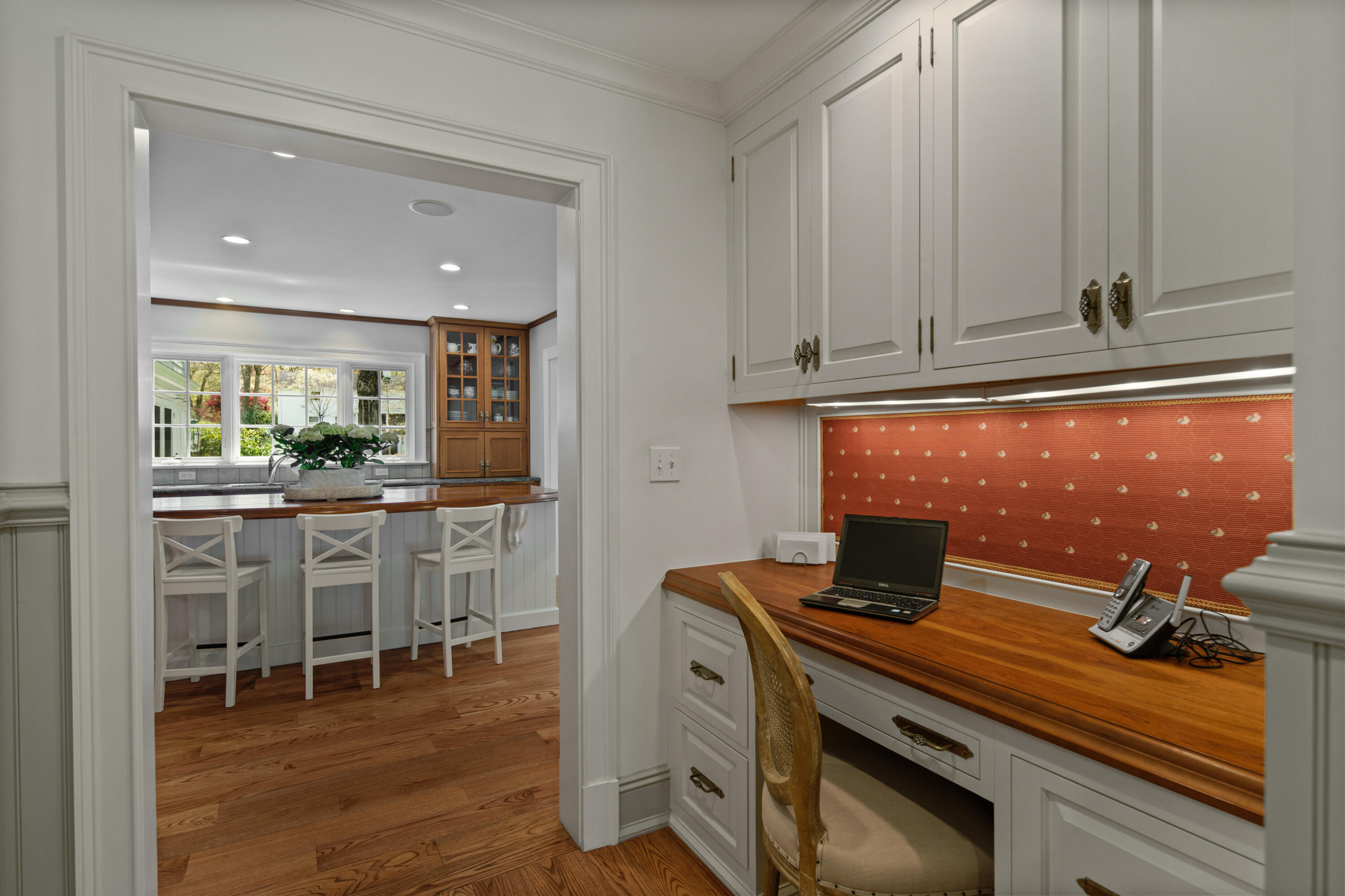398 Valley Road New Canaan, CT 06840 - Photo 13 of 44 a kitchen with a sink and cabinets