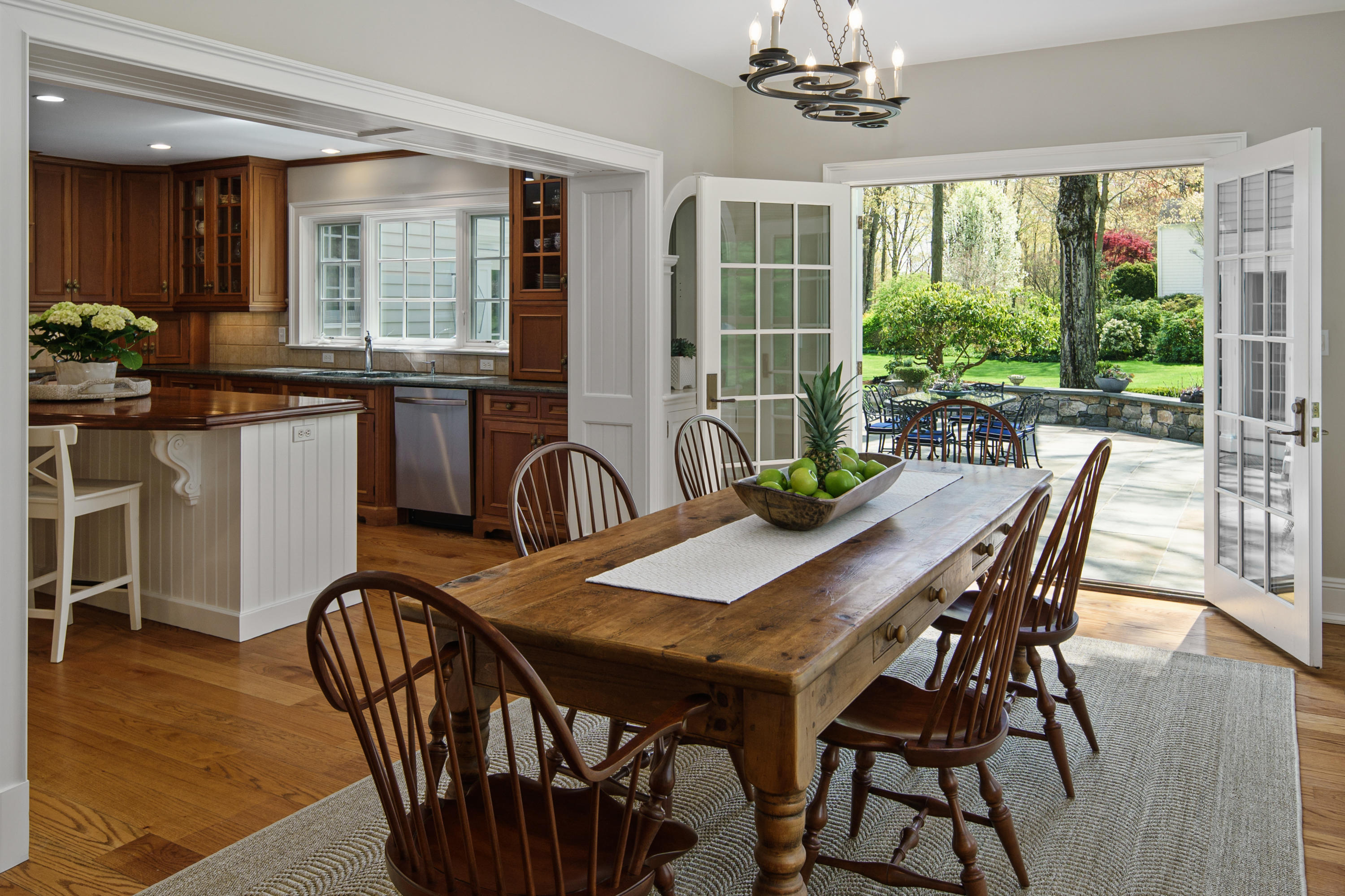 398 Valley Road New Canaan, CT 06840 - Photo 14 of 44 a view of a dining room with furniture window and outside view