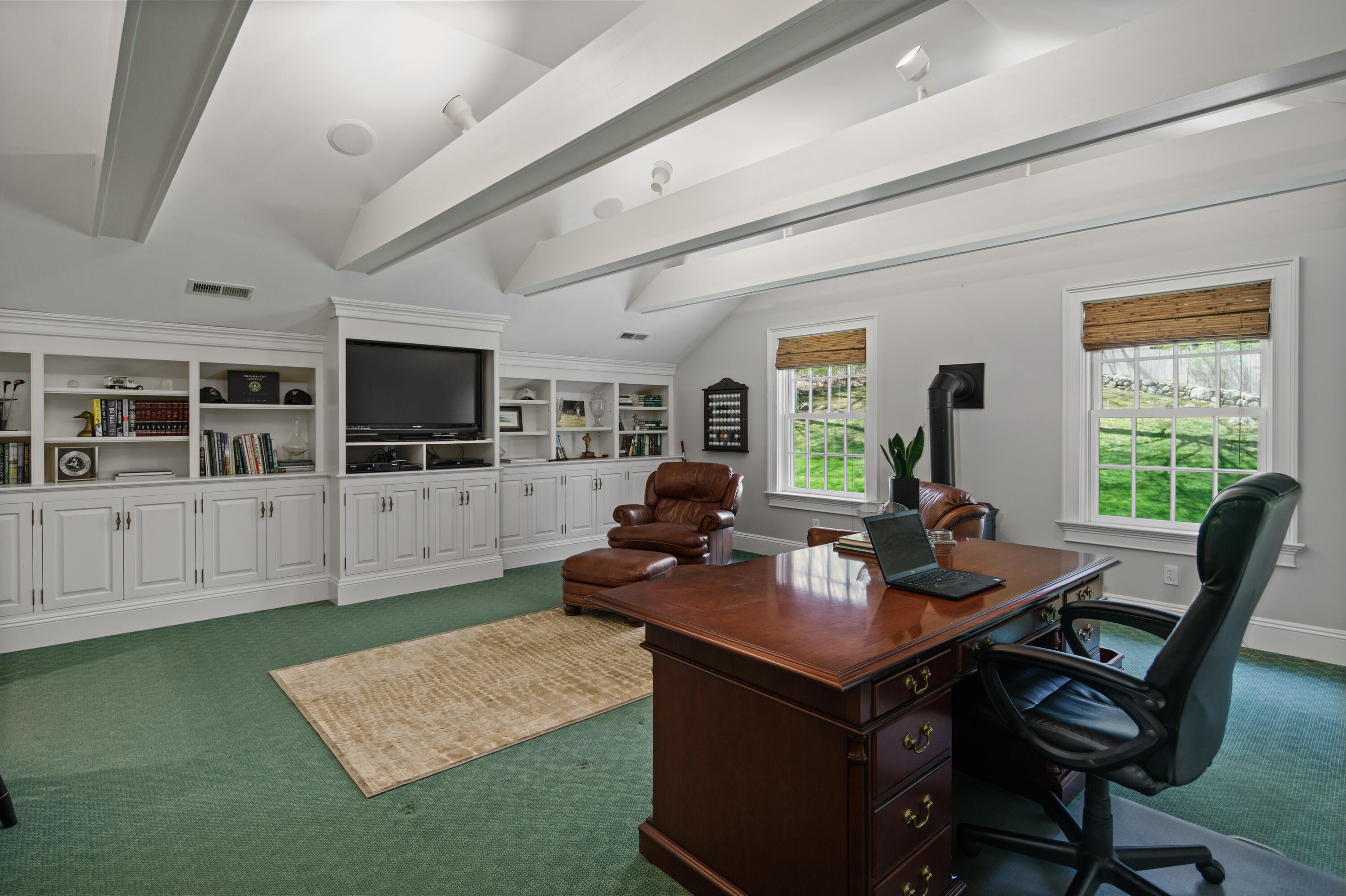 398 Valley Road New Canaan, CT 06840 - Photo 18 of 44 a view of a workspace with furniture