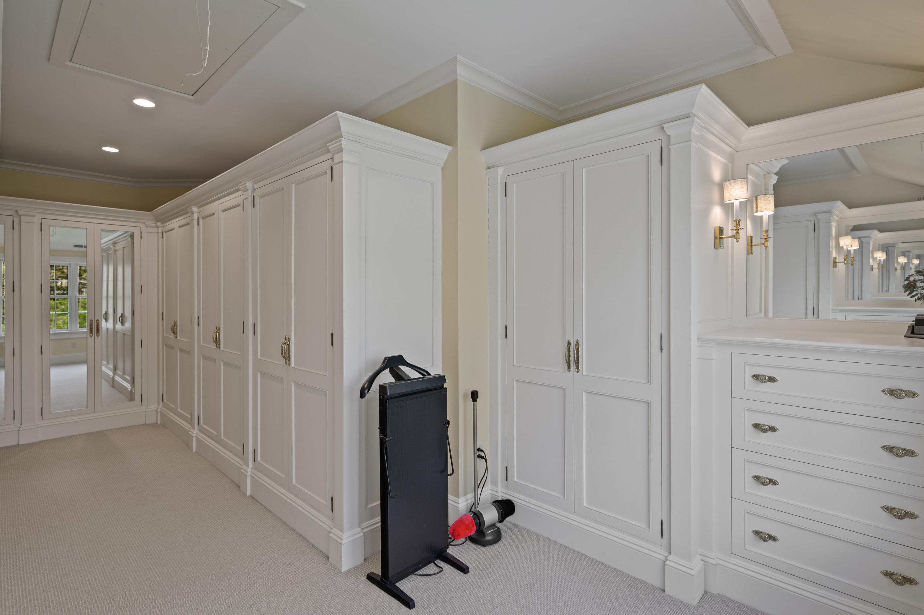 398 Valley Road New Canaan, CT 06840 - Photo 22 of 44 a view of a hallway with closet
