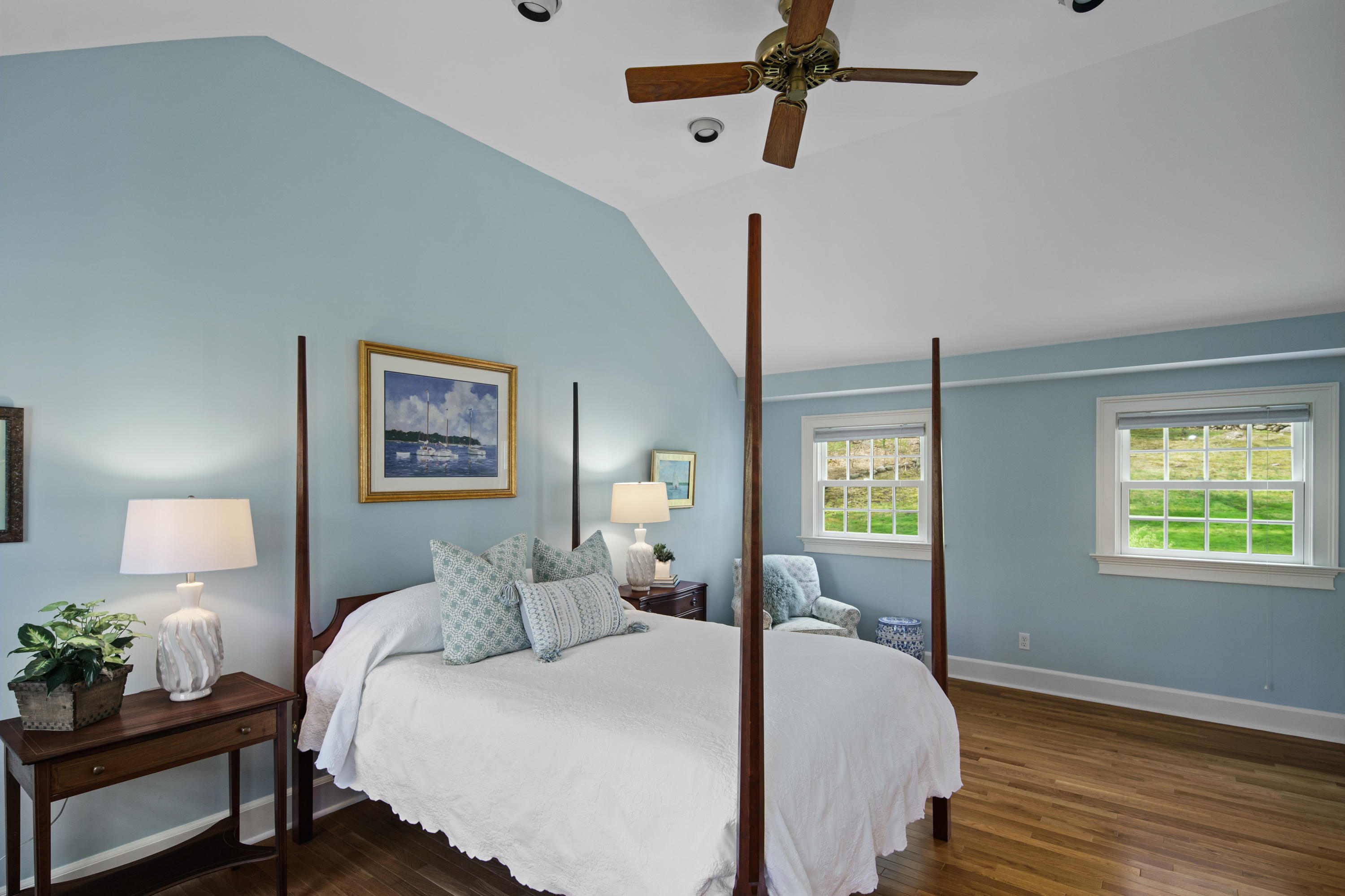 398 Valley Road New Canaan, CT 06840 - Photo 23 of 44 a spacious bedroom with a bed and a window