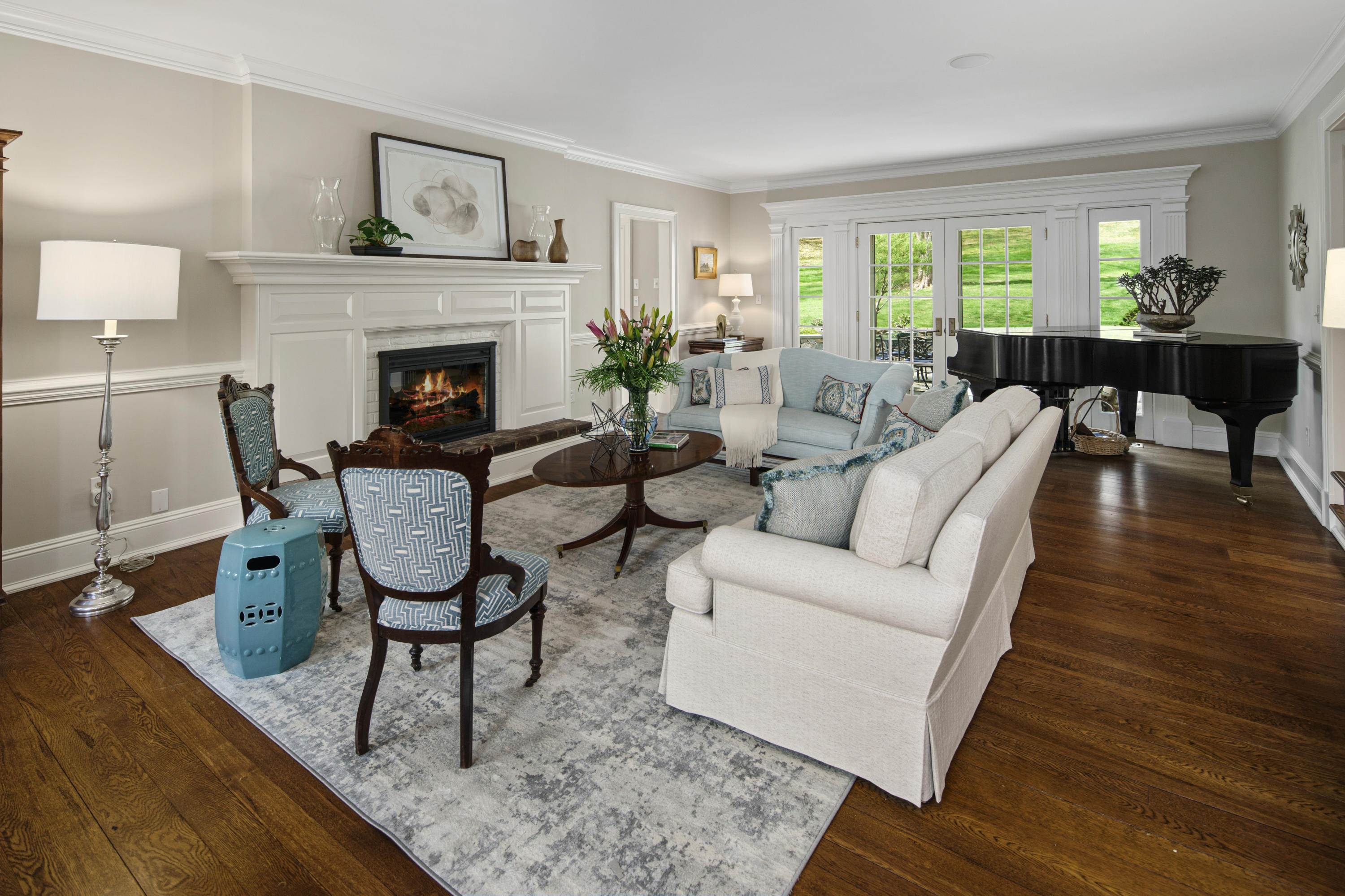 398 Valley Road New Canaan, CT 06840 - Photo 6 of 44 a living room with furniture and a fireplace
