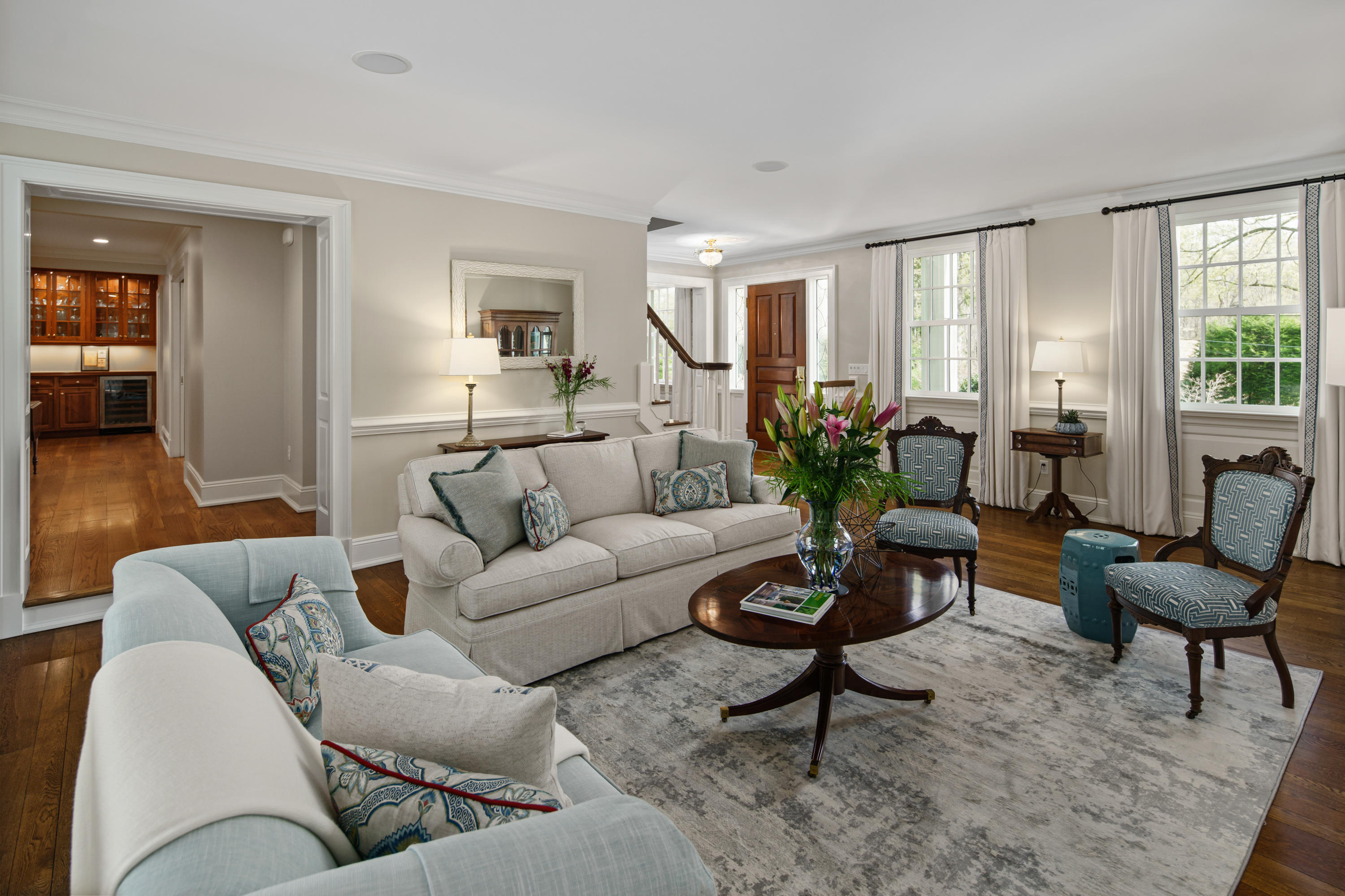 398 Valley Road New Canaan, CT 06840 - Photo 7 of 44 a living room with furniture and a potted plant