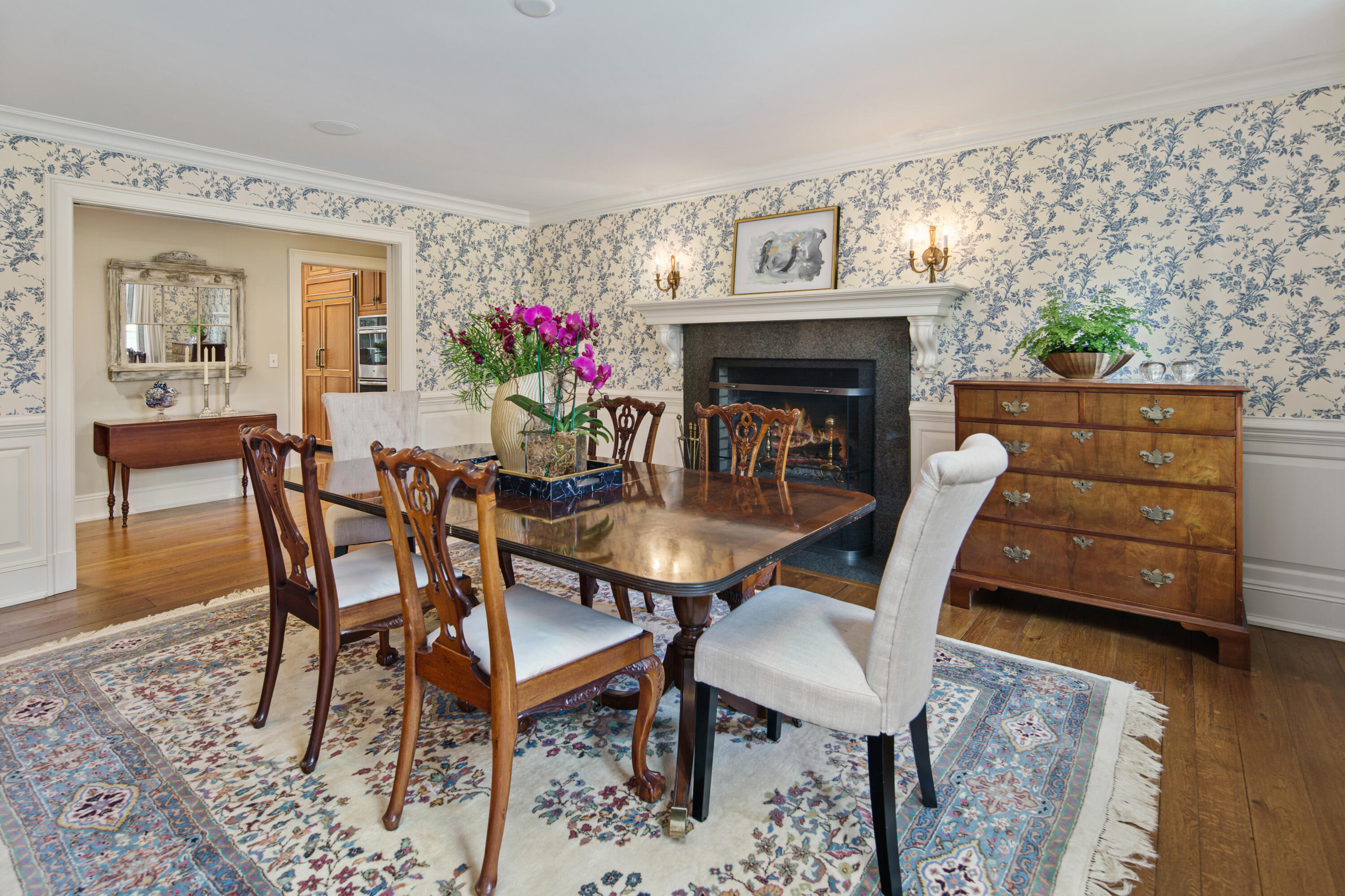 398 Valley Road New Canaan, CT 06840 - Photo 9 of 44 a dining room with furniture and wooden floor