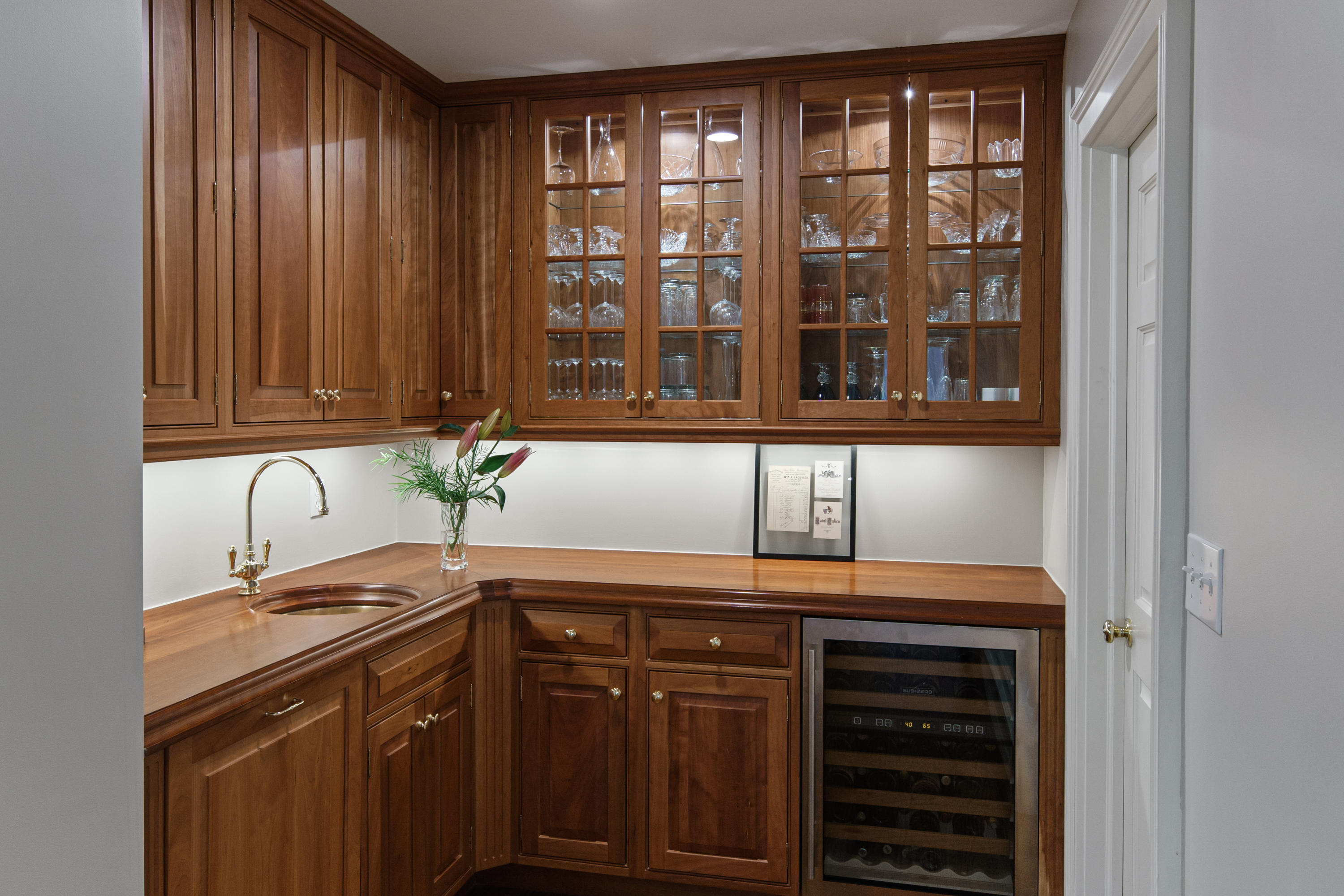 398 Valley Road New Canaan, CT 06840 - Photo 10 of 44 a kitchen with a sink and cabinets