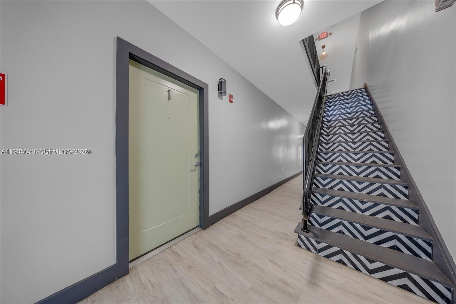 1020 Southwest 23rd Avenue, Unit 3 Miami, FL 33135 - Photo 11 of 15 a view of an entryway with wooden floor