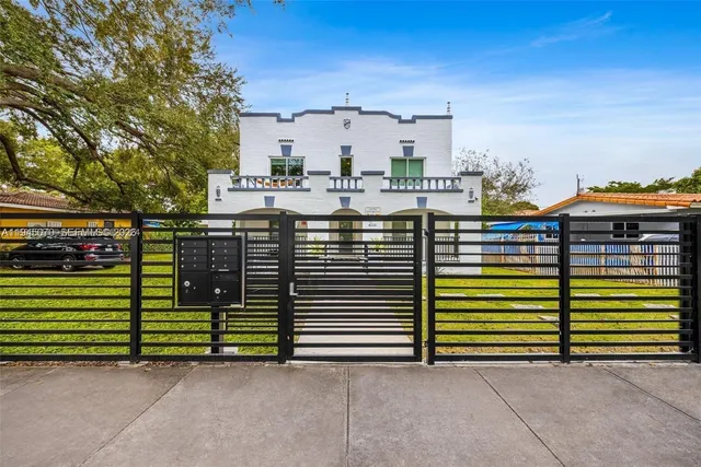 a view of a house with a street