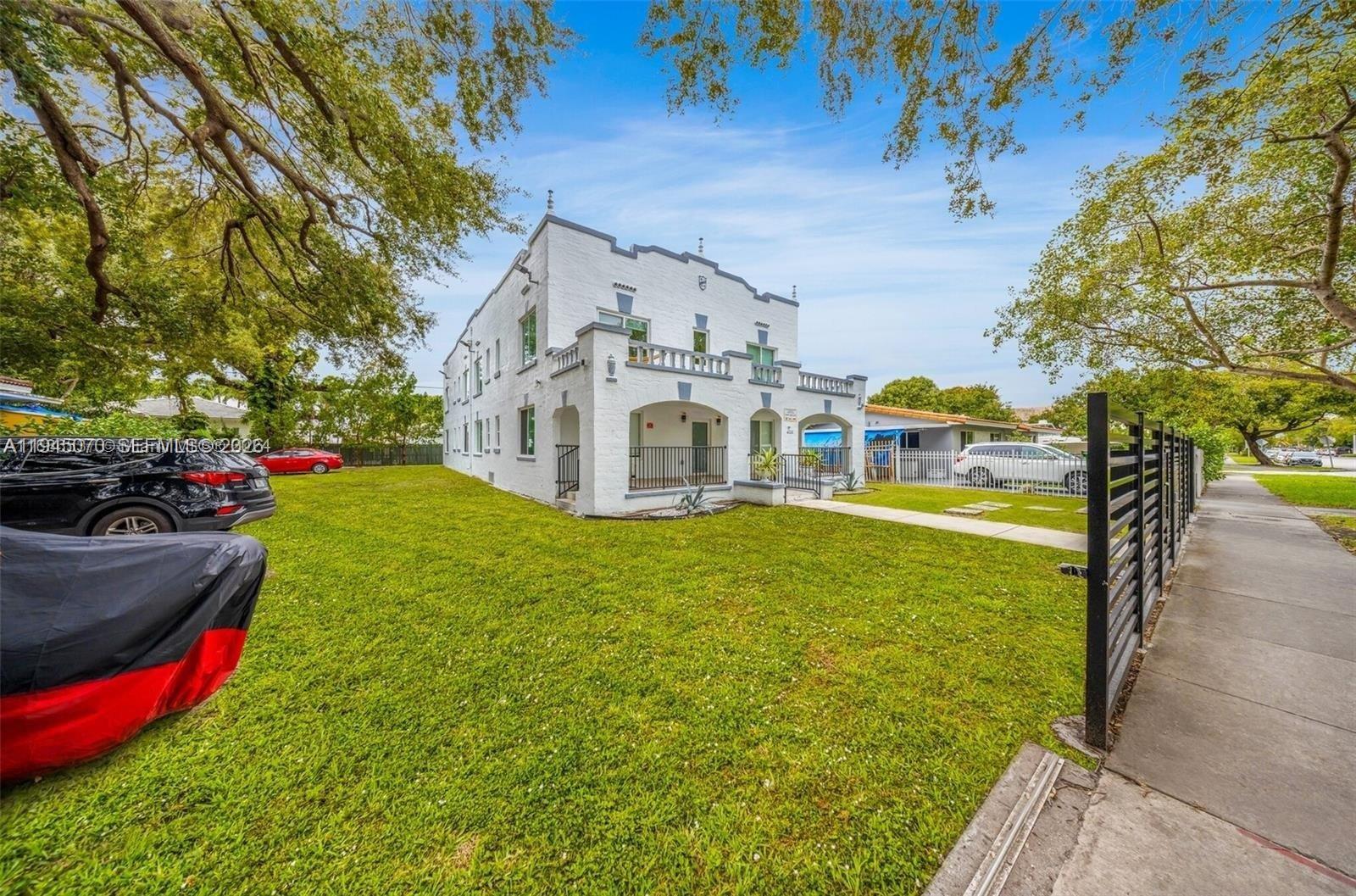 1020 Southwest 23rd Avenue, Unit 3 Miami, FL 33135 - Photo 14 of 15 a view of a house with a swimming pool