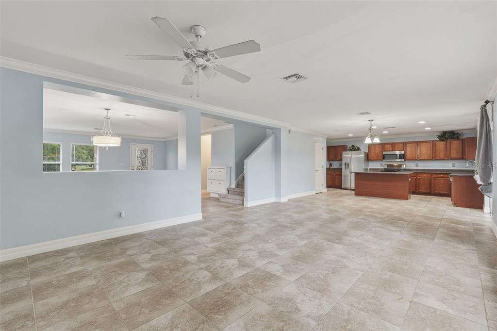 25134 Palisade Road Punta Gorda, FL 33983 - Photo 14 of 58 a view of a kitchen with a sink and a stove top oven
