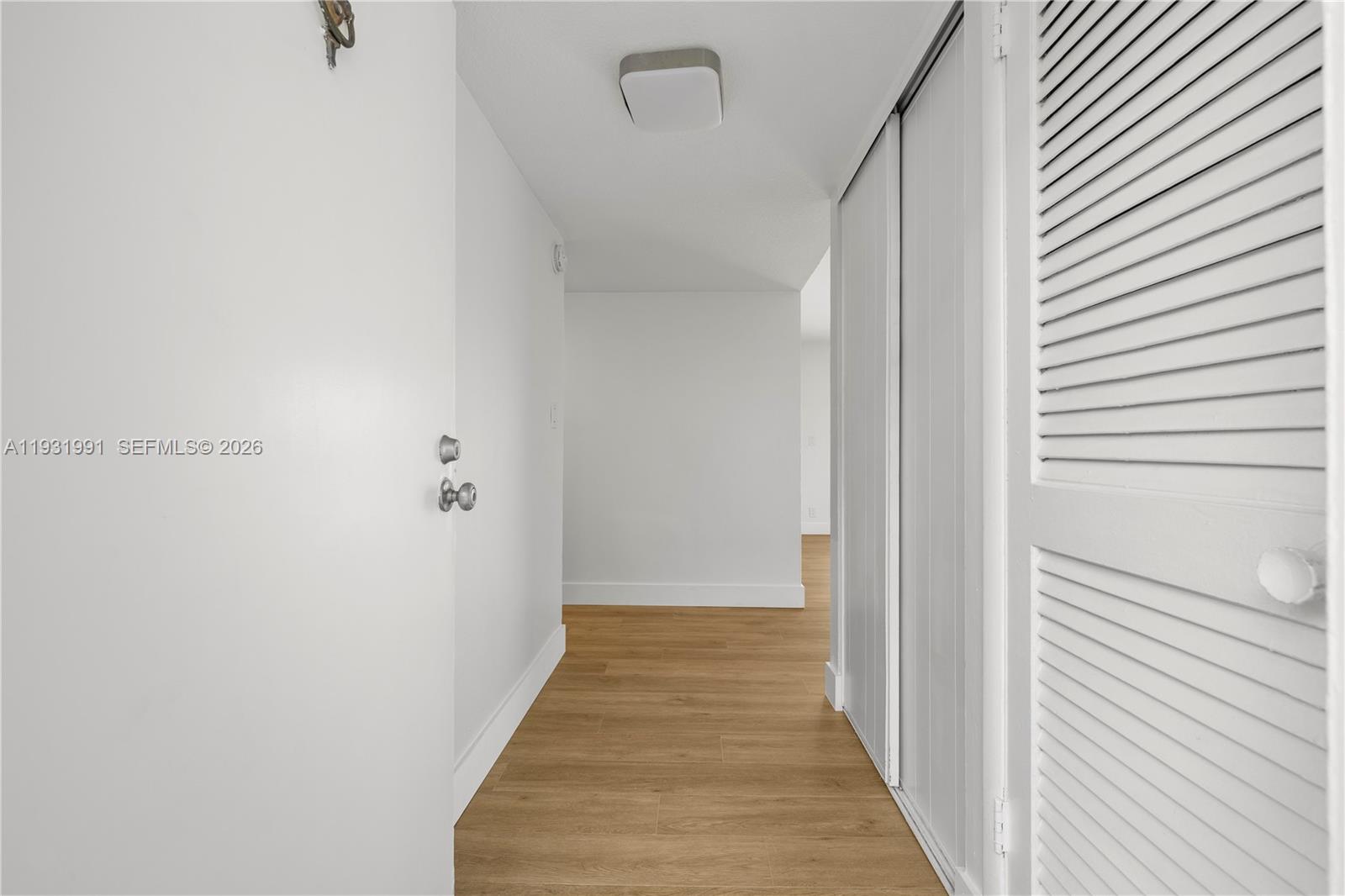 455 South Pine Island Road, Unit 307C Plantation, FL 33324 - Photo 3 of 30 a view of a hallway with wooden floor