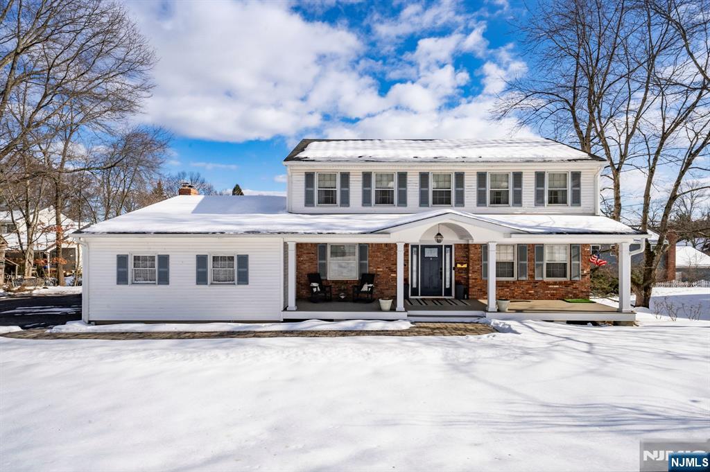 a front view of a building with a view of house
