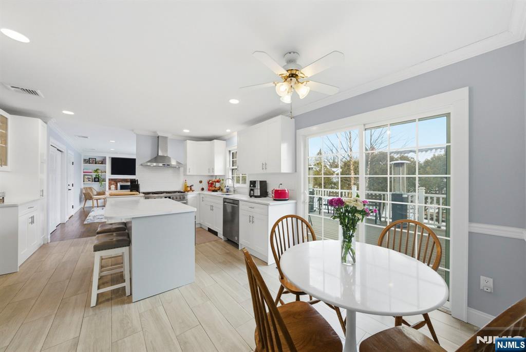 18 Laura Lane Park Ridge, NJ 07656 - Photo 12 of 36 a view of a dining room with furniture window and wooden floor