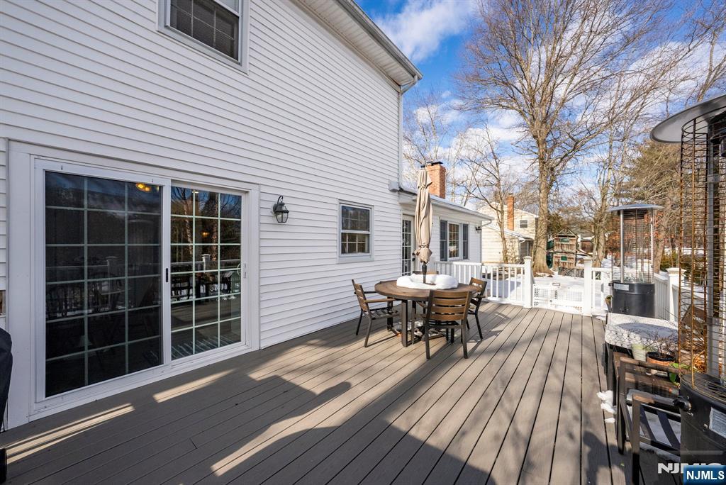 18 Laura Lane Park Ridge, NJ 07656 - Photo 21 of 36 a view of a house with backyard and sitting area