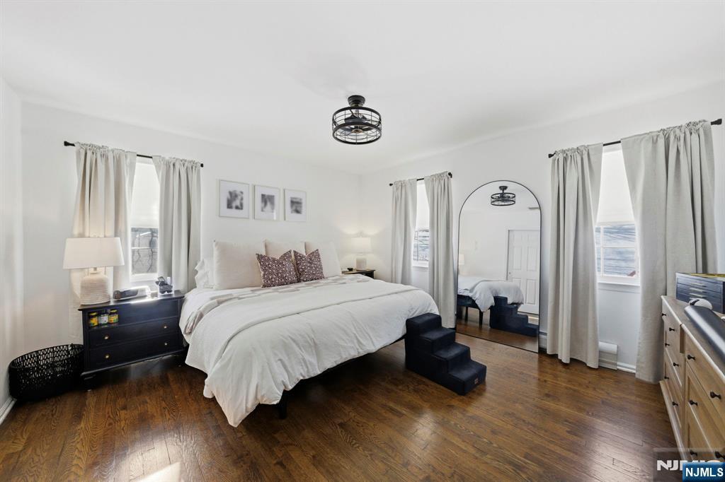 18 Laura Lane Park Ridge, NJ 07656 - Photo 30 of 36 a bedroom with a bed and a window