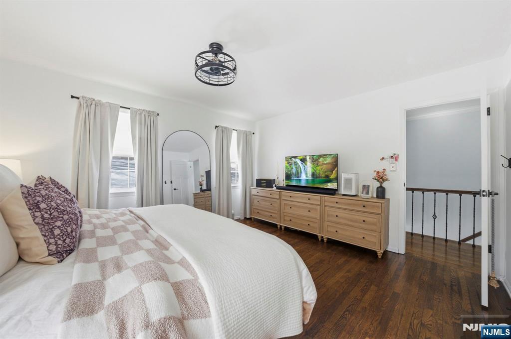 18 Laura Lane Park Ridge, NJ 07656 - Photo 32 of 36 a bedroom with a bed and a dresser