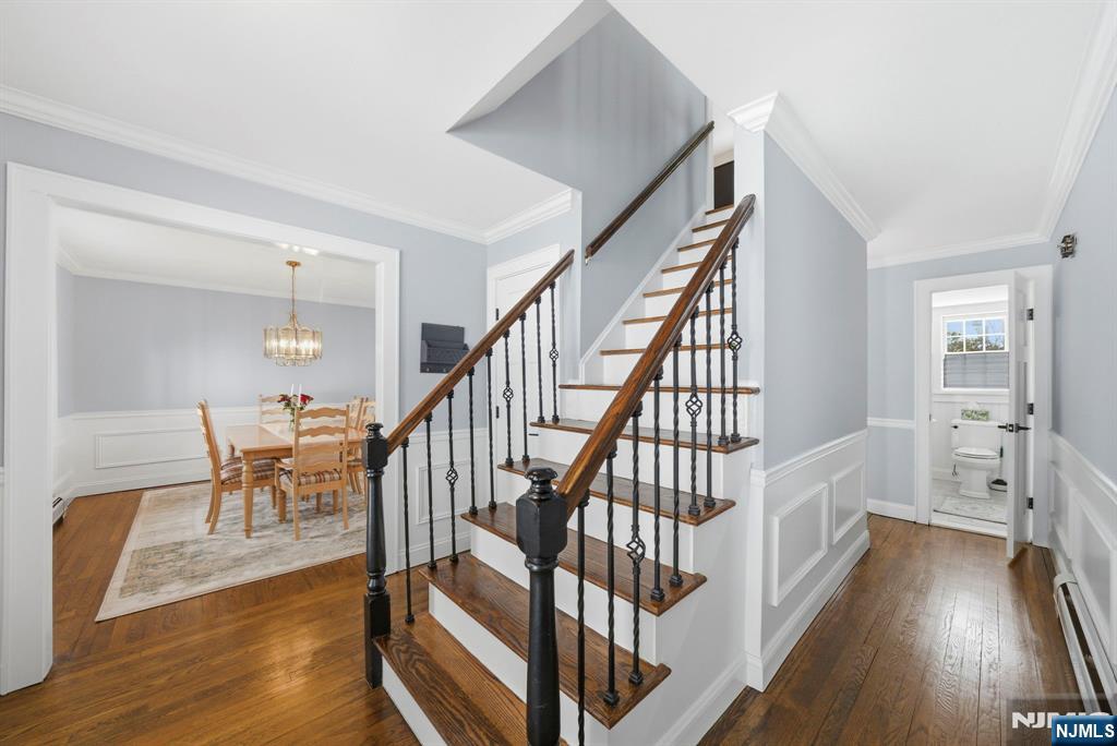 18 Laura Lane Park Ridge, NJ 07656 - Photo 4 of 36 a view of entryway and hall with wooden floor