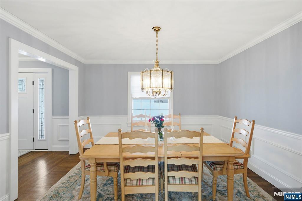 18 Laura Lane Park Ridge, NJ 07656 - Photo 9 of 36 a view of a dining room with furniture window and wooden floor