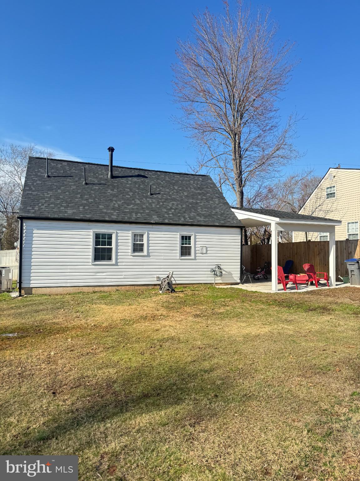 115 Travis Street Manassas, VA 20111 - Photo 2 of 2 a front view of a house with a yard