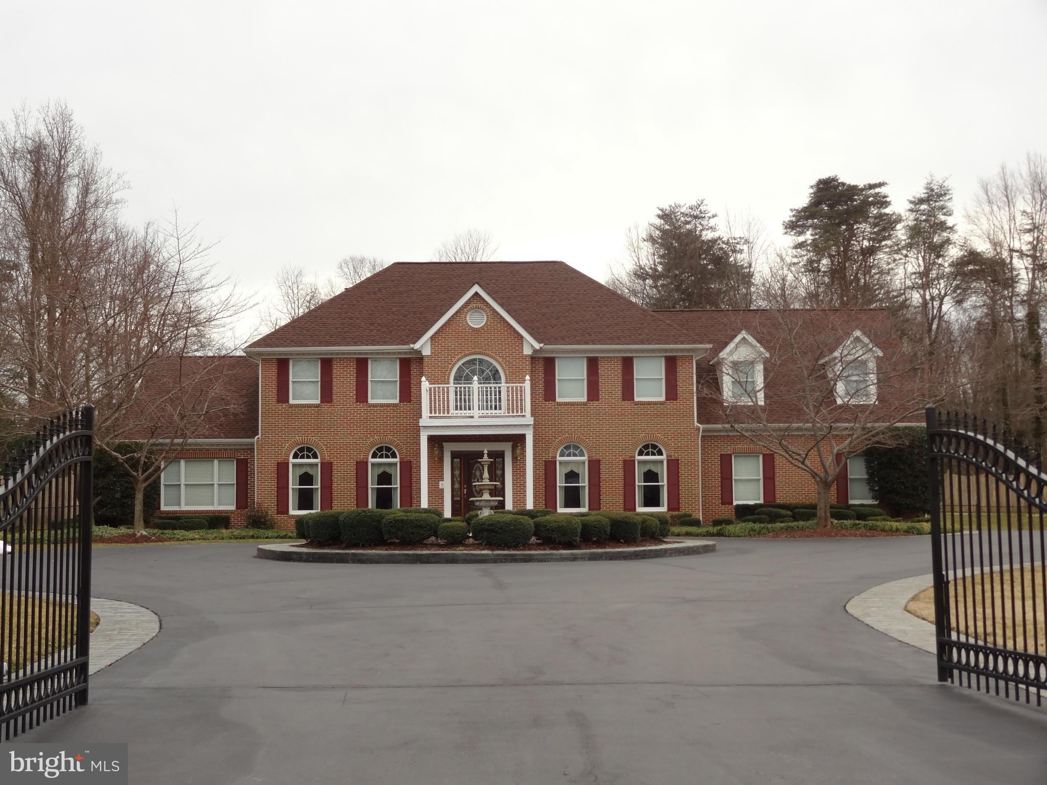 491 Ferry Point Road Annapolis, MD 21403 - Photo 1 of 30 a front view of a house with a yard