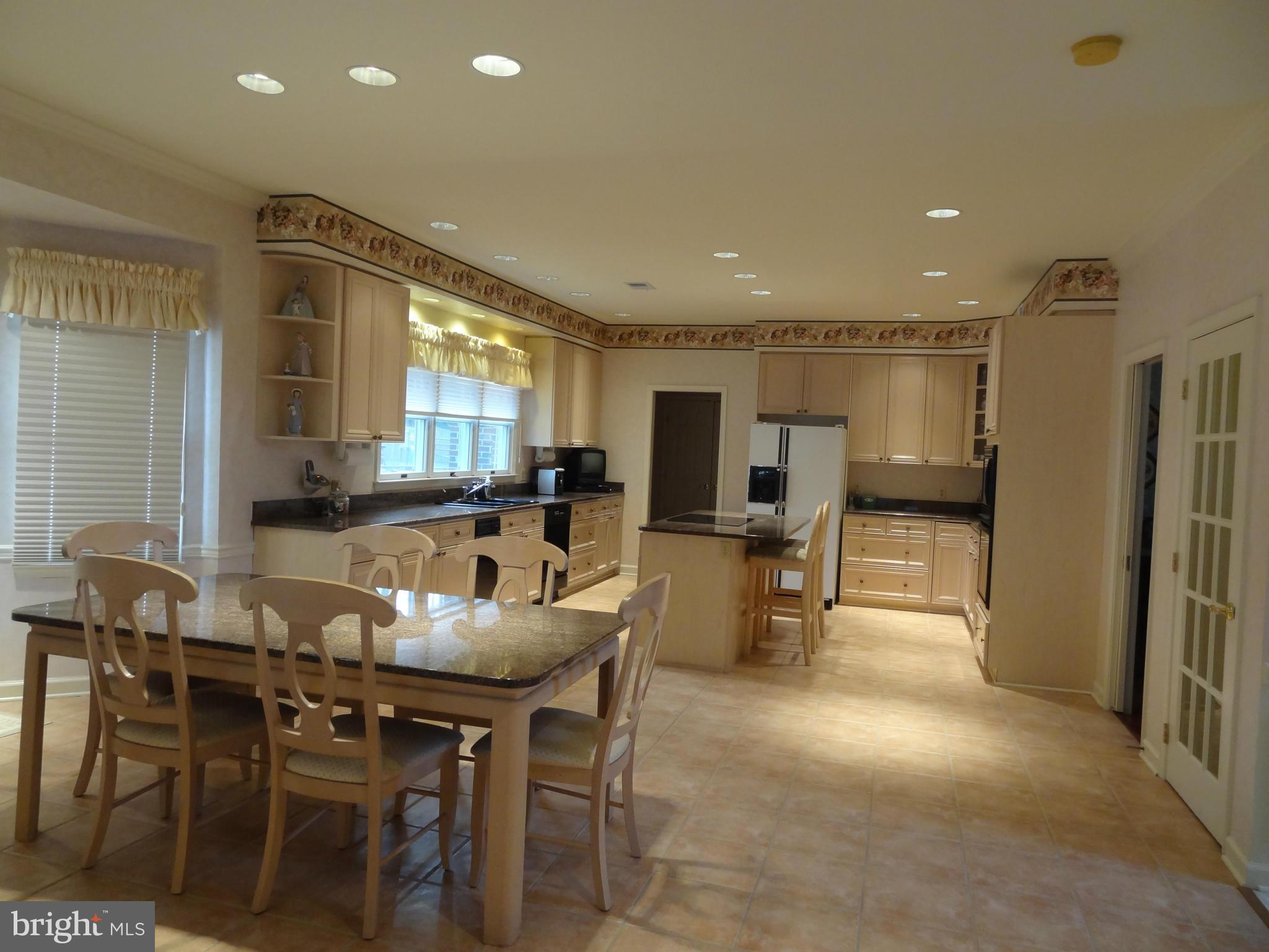 491 Ferry Point Road Annapolis, MD 21403 - Photo 2 of 30 a view of a dining room with furniture