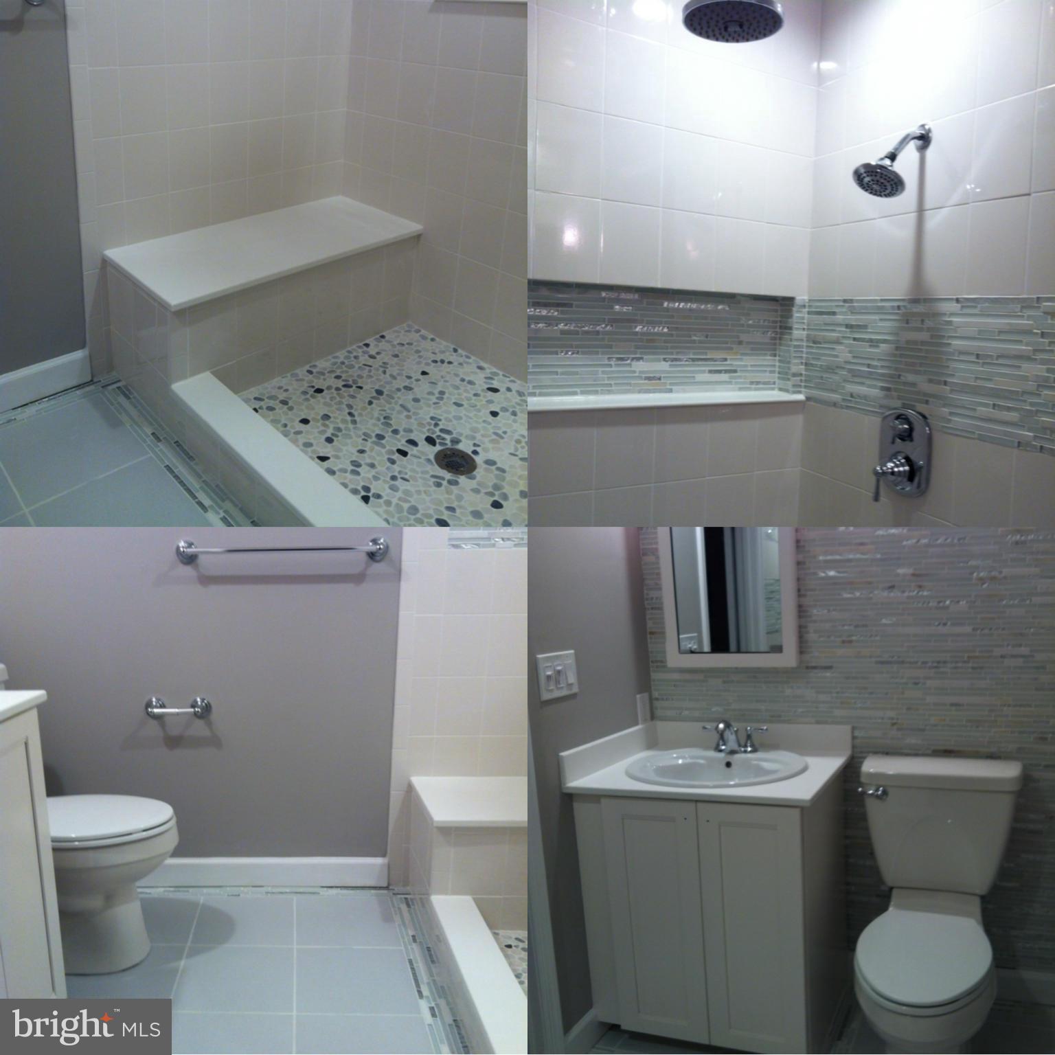 491 Ferry Point Road Annapolis, MD 21403 - Photo 13 of 30 a bathroom with a toilet a sink and mirror