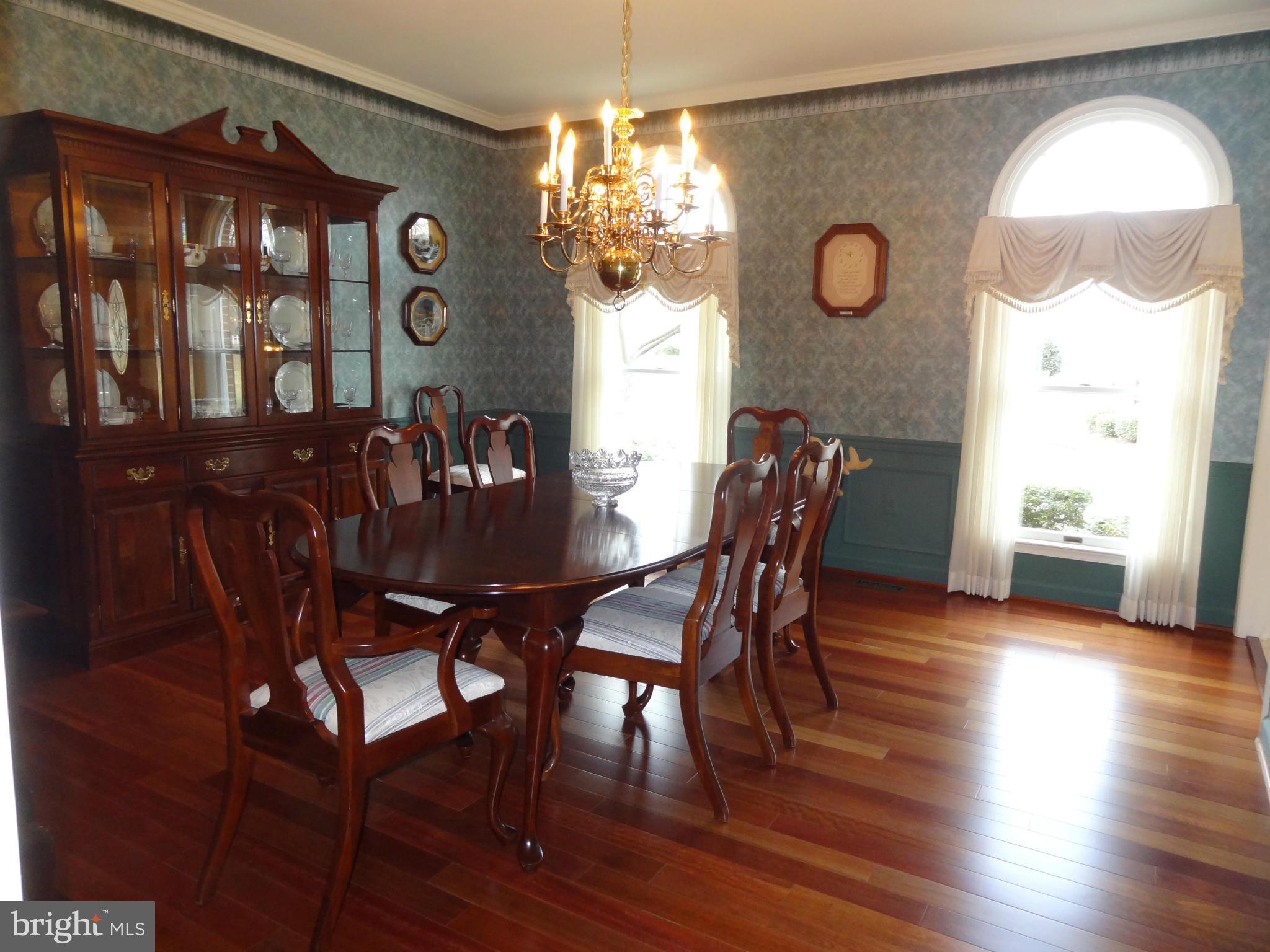 491 Ferry Point Road Annapolis, MD 21403 - Photo 17 of 30 a view of a dining room with furniture window and wooden floor