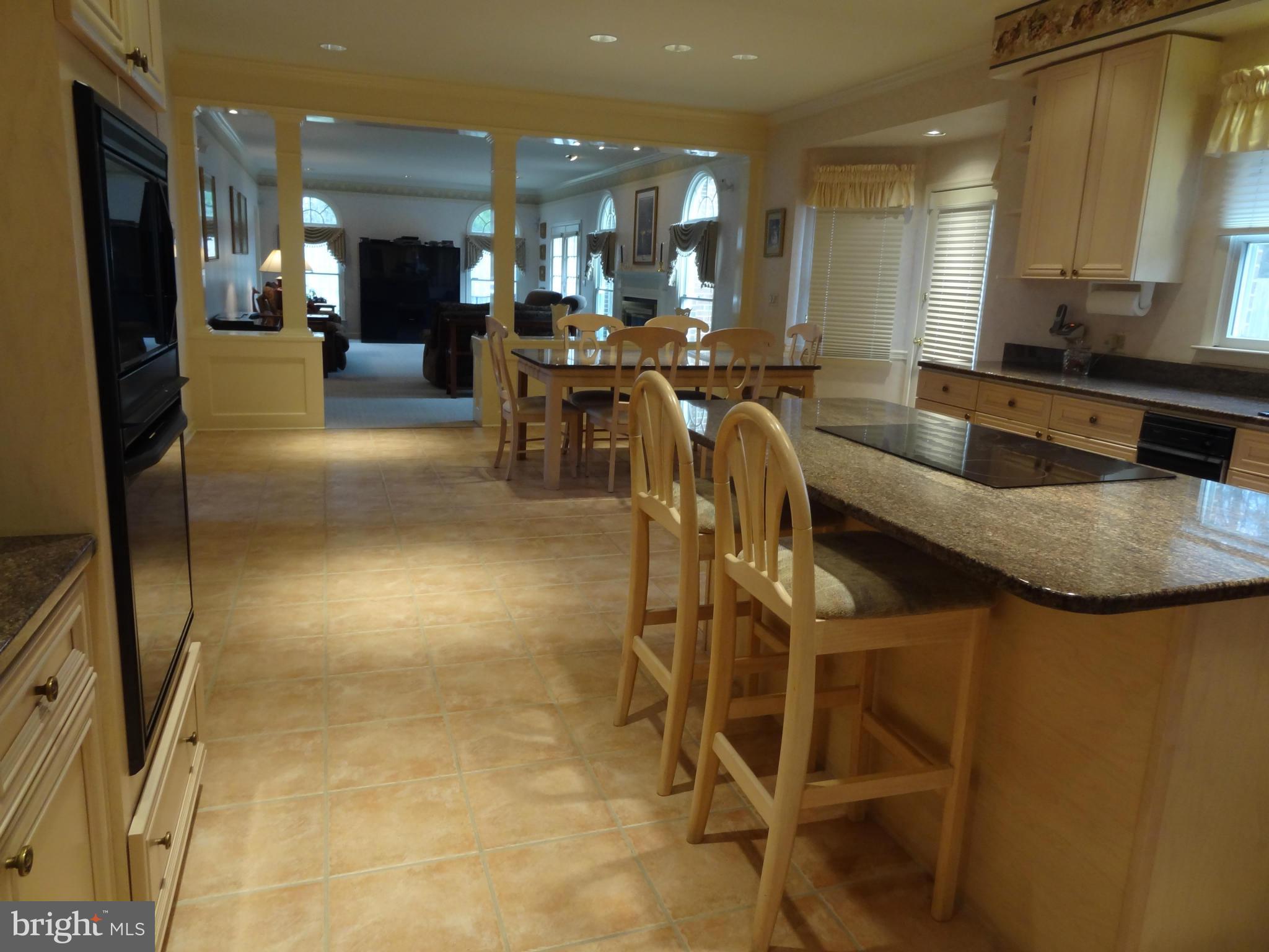 491 Ferry Point Road Annapolis, MD 21403 - Photo 19 of 30 a view of a dining area with furniture