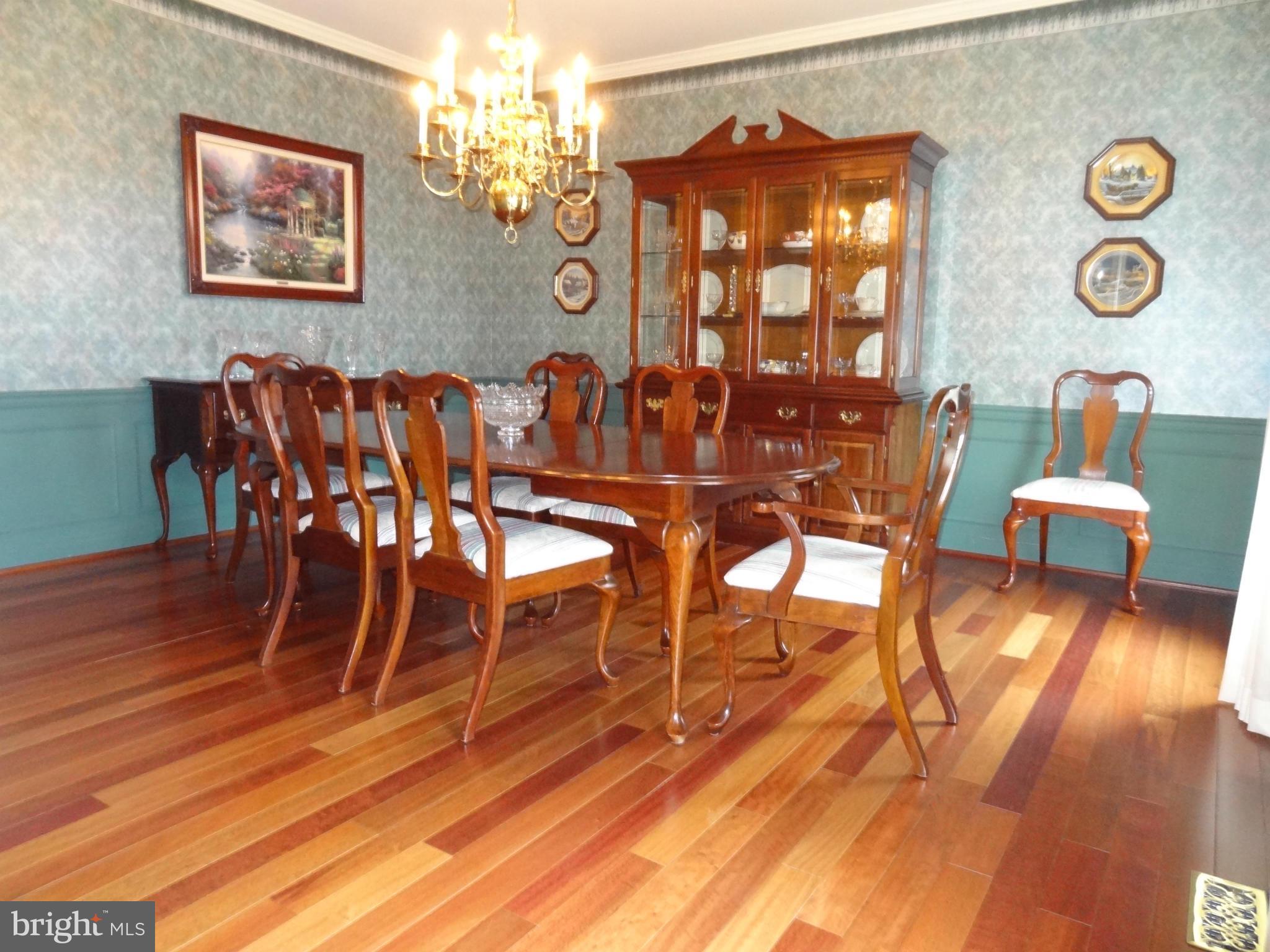 491 Ferry Point Road Annapolis, MD 21403 - Photo 3 of 30 a dining room with wooden floor and large window
