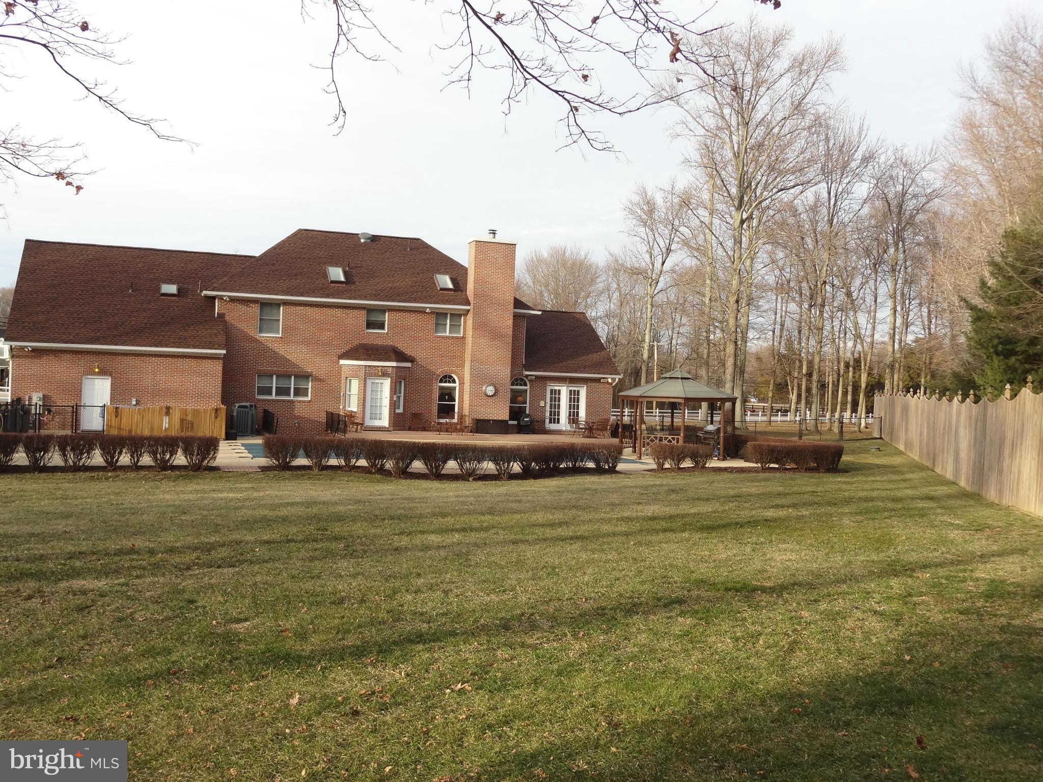 491 Ferry Point Road Annapolis, MD 21403 - Photo 24 of 30 a house view with swimming pool in front of it