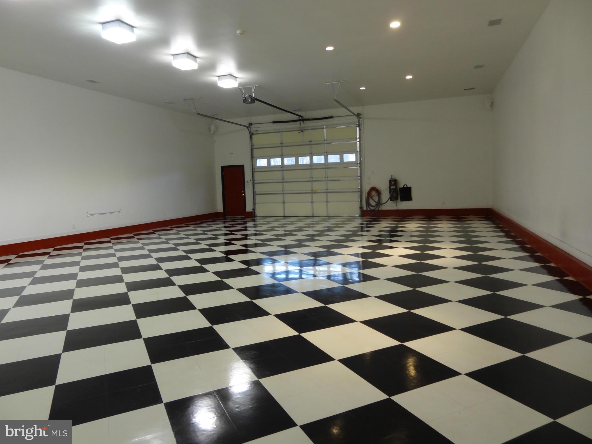 491 Ferry Point Road Annapolis, MD 21403 - Photo 27 of 30 a view of a room with a checkered floor and window