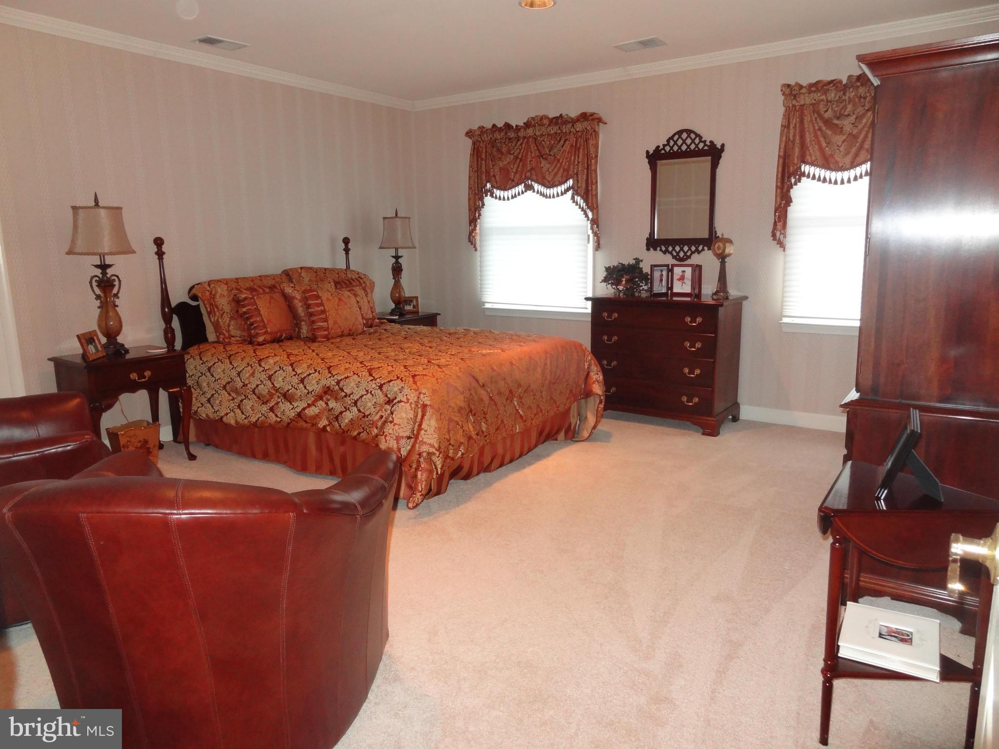 491 Ferry Point Road Annapolis, MD 21403 - Photo 9 of 30 a bedroom with bed and window