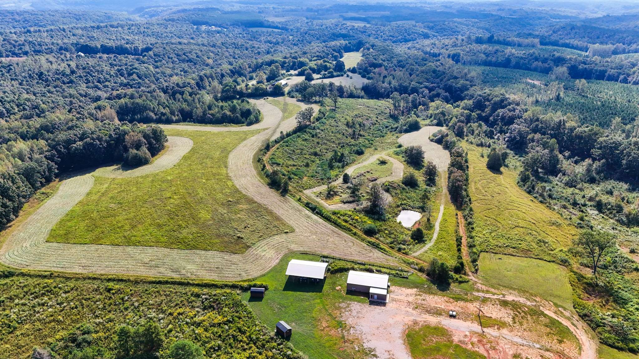 437 South Ore Road Westpoint, TN 38486 - Photo 12 of 58 an aerial view of a house with a yard and lake view