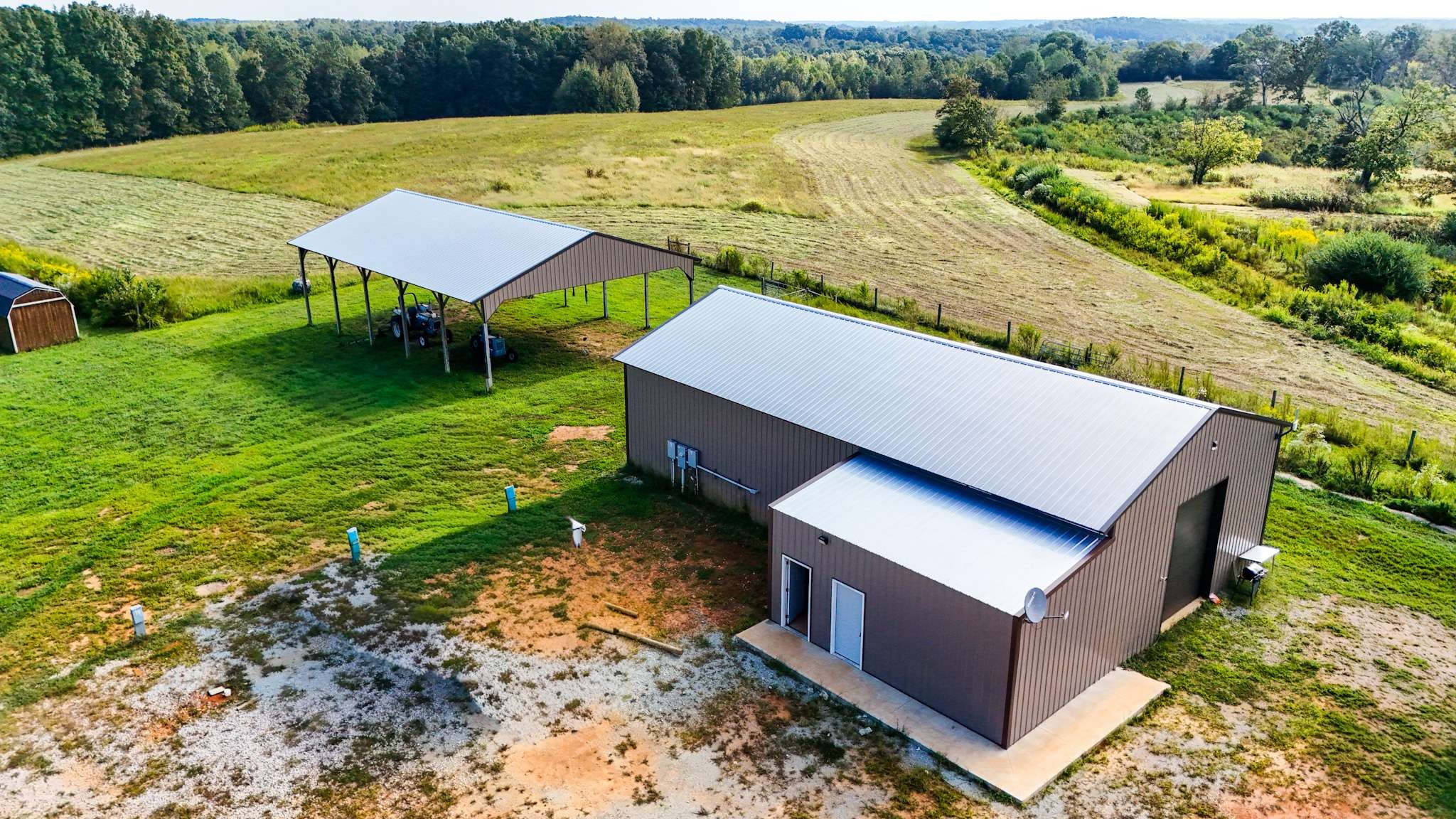 437 South Ore Road Westpoint, TN 38486 - Photo 2 of 58 an aerial view of a house with pool garden and a yard