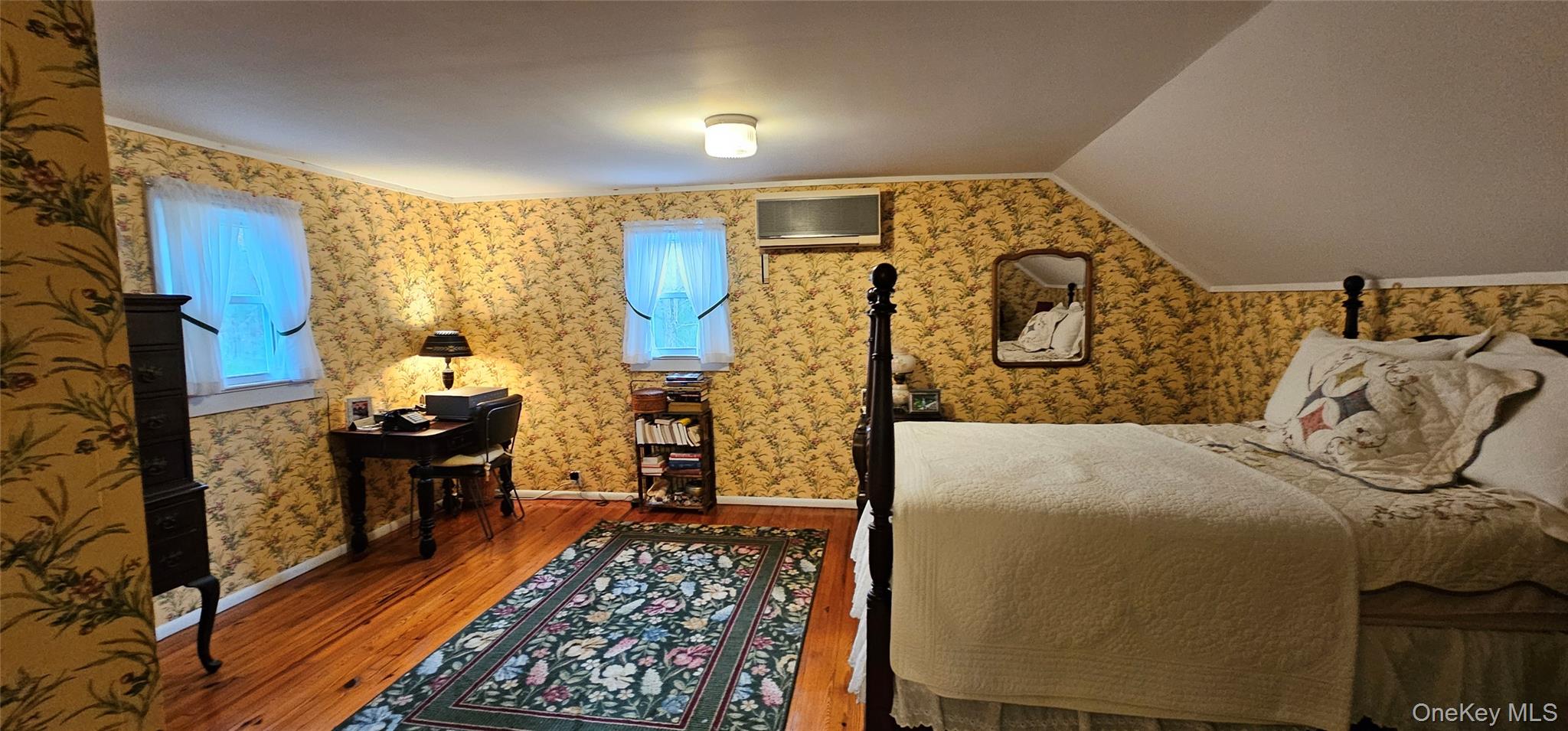 191 Eldred-Yulan Road Eldred, NY 12732 - Photo 19 of 34 a bed room with a bed and a couch