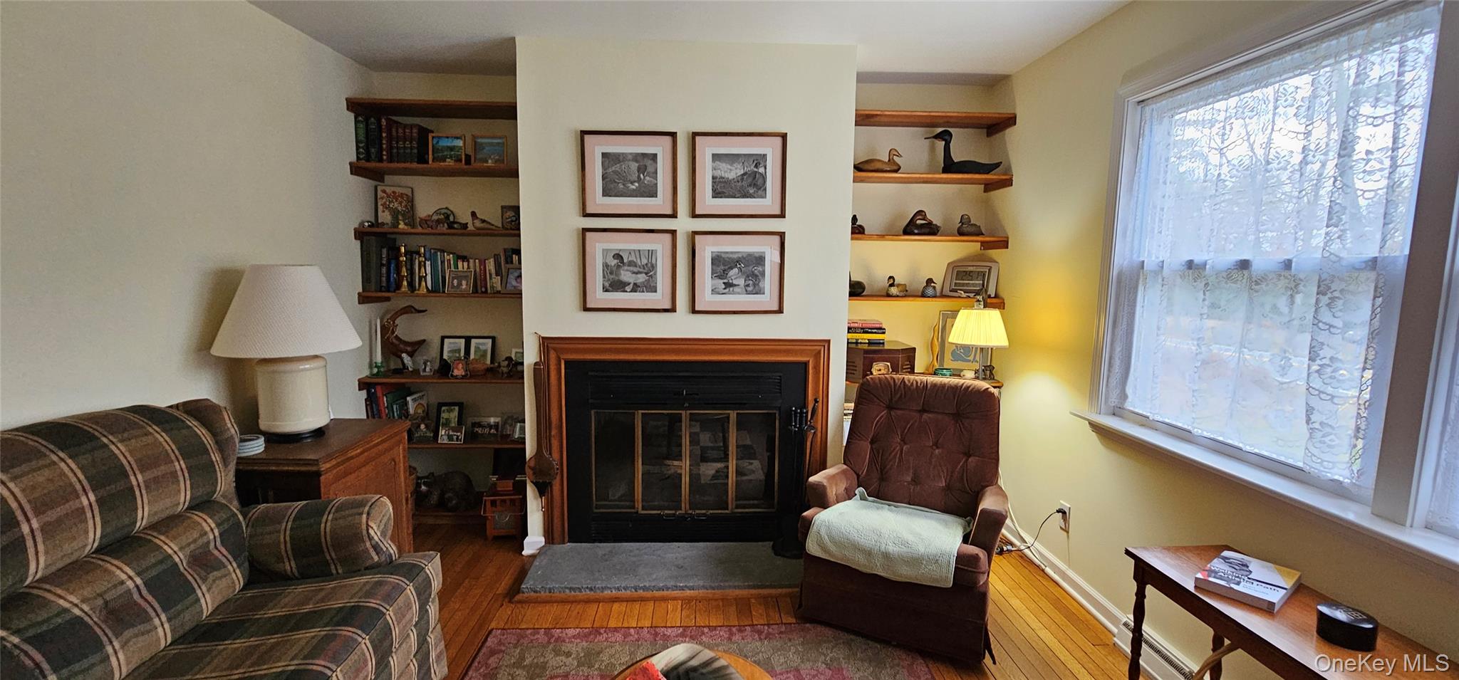 191 Eldred-Yulan Road Eldred, NY 12732 - Photo 5 of 34 a living room with furniture and a fireplace