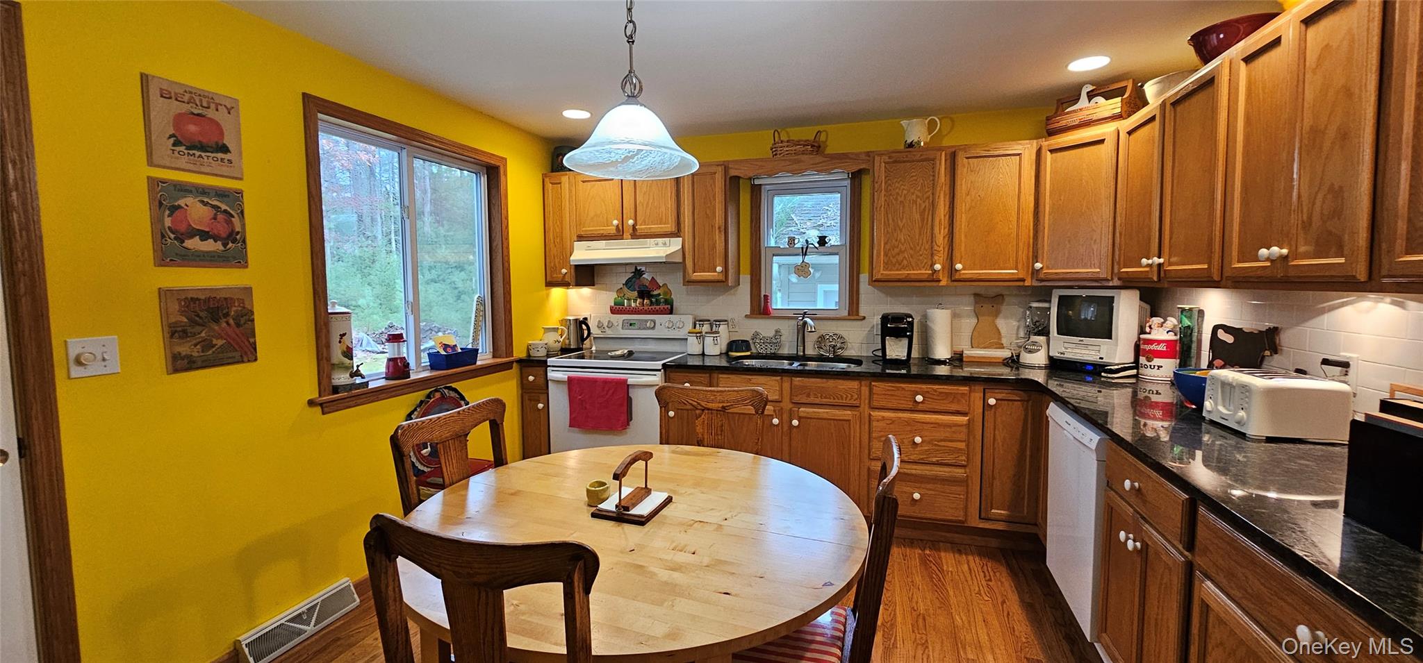 191 Eldred-Yulan Road Eldred, NY 12732 - Photo 6 of 34 a kitchen with stainless steel appliances granite countertop a sink a stove and a refrigerator