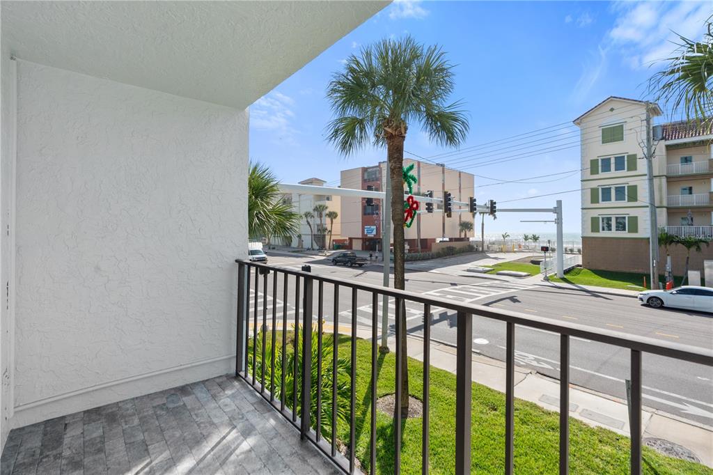 14001 Gulf Boulevard, Unit 201 Madeira Beach, FL 33708 - Photo 15 of 36 a view of a swimming pool with a house