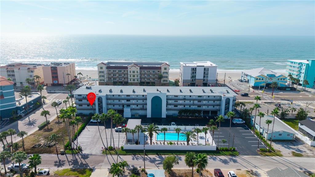 14001 Gulf Boulevard, Unit 201 Madeira Beach, FL 33708 - Photo 30 of 36 a view of houses with an outdoor seating