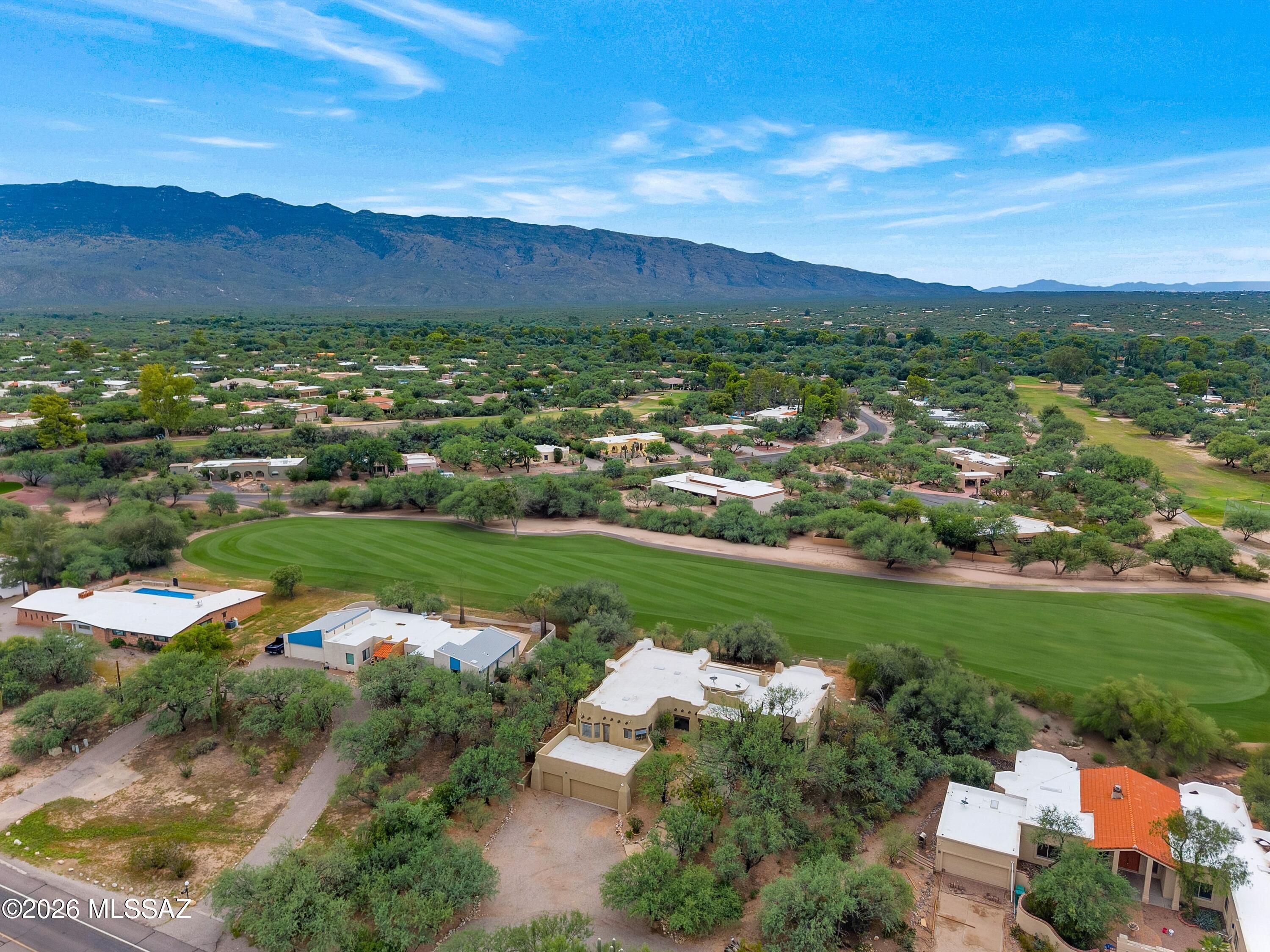 12160 East Tanque Verde Road Tucson, AZ 85749 - Photo 11 of 53 Golf course fairway and neighborhood views with mountain backdrop.