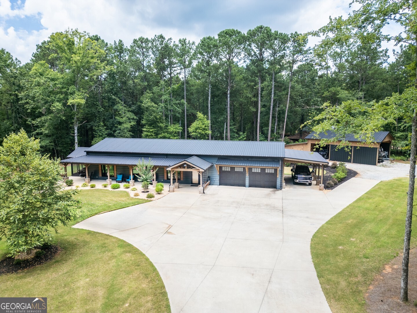 2591 Reids Ferry Road Buckhead, GA 30625 - Photo 1 of 1 a view of a swimming pool with a patio