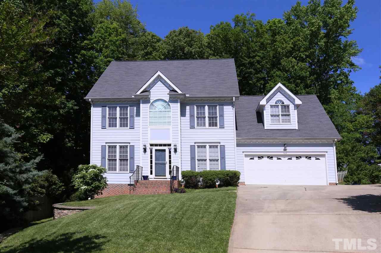 6729 Hammersmith Drive Raleigh, NC 27613 - Photo 1 of 21 a front view of a house with a yard