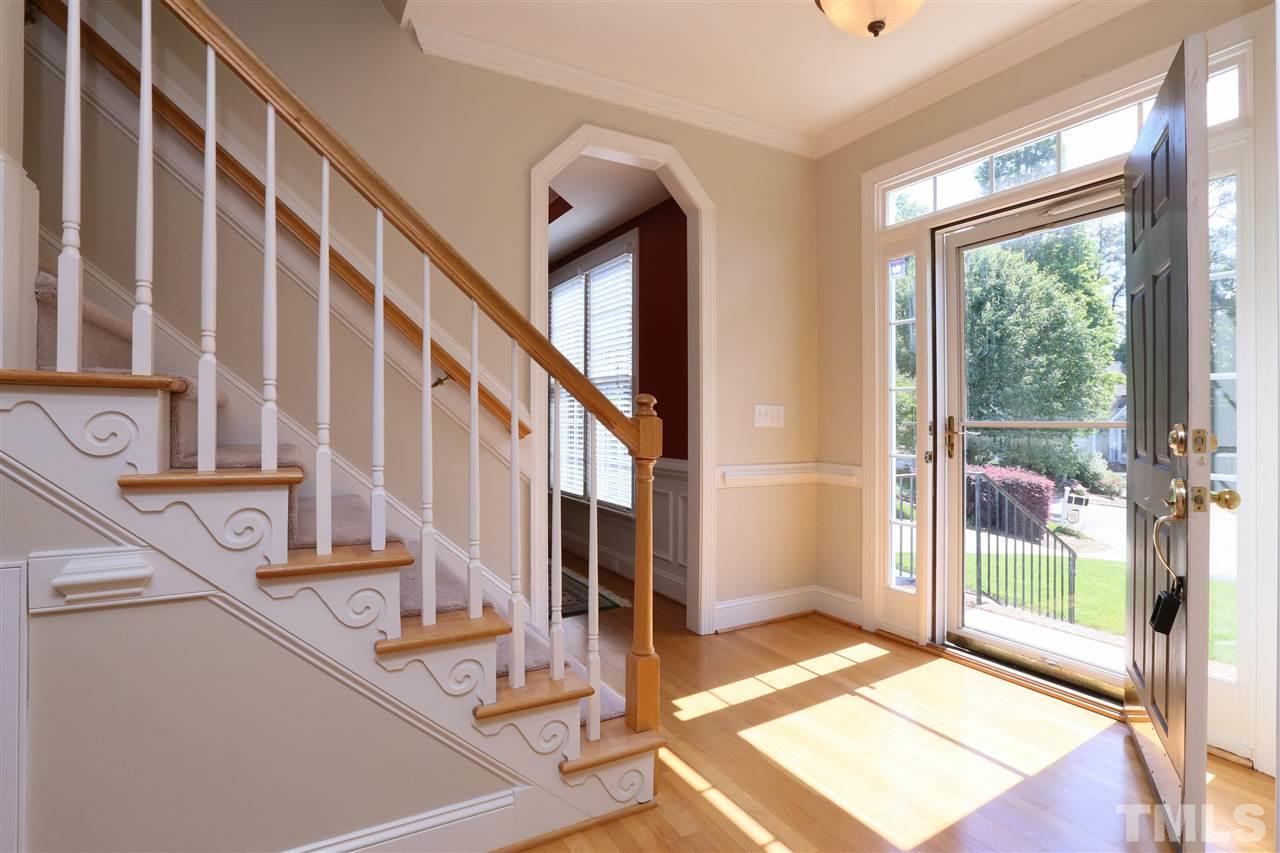 6729 Hammersmith Drive Raleigh, NC 27613 - Photo 2 of 21 a view of an entryway with staircase