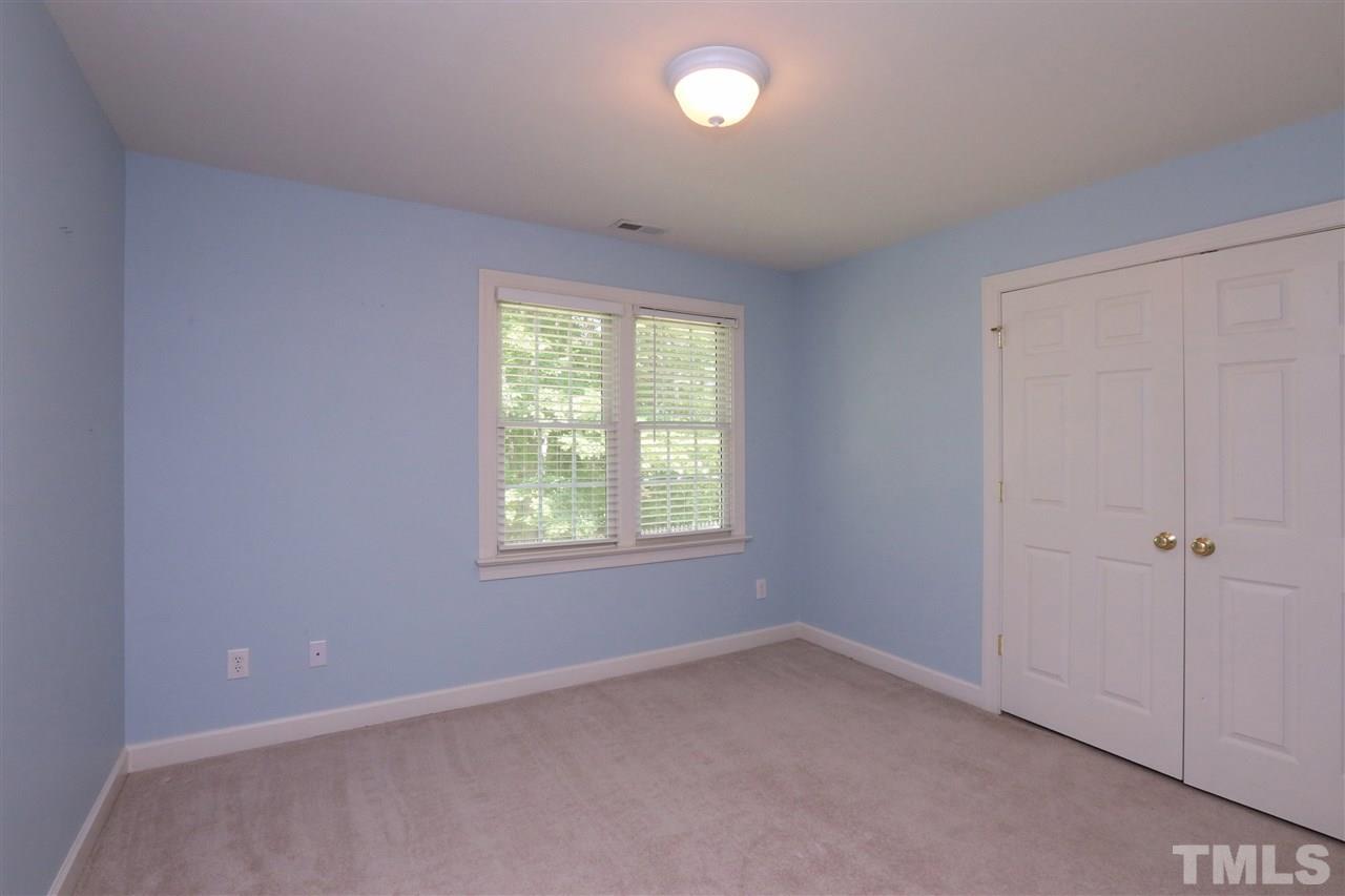 6729 Hammersmith Drive Raleigh, NC 27613 - Photo 13 of 21 an empty room with a window