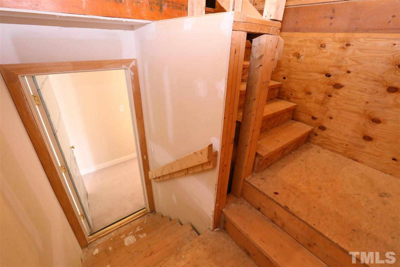 6729 Hammersmith Drive Raleigh, NC 27613 - Photo 18 of 21 a view of walk in closet