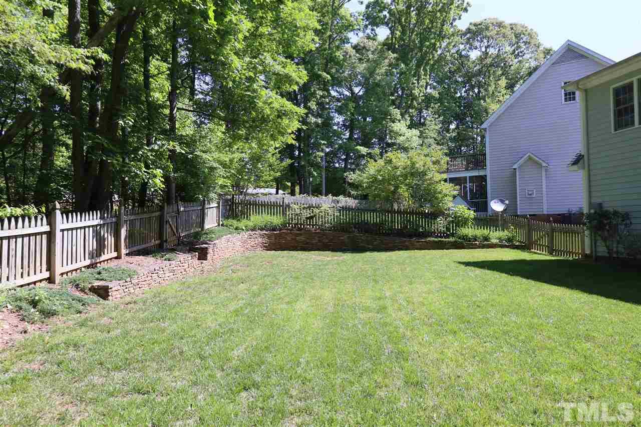 6729 Hammersmith Drive Raleigh, NC 27613 - Photo 20 of 21 a view of back yard of the house