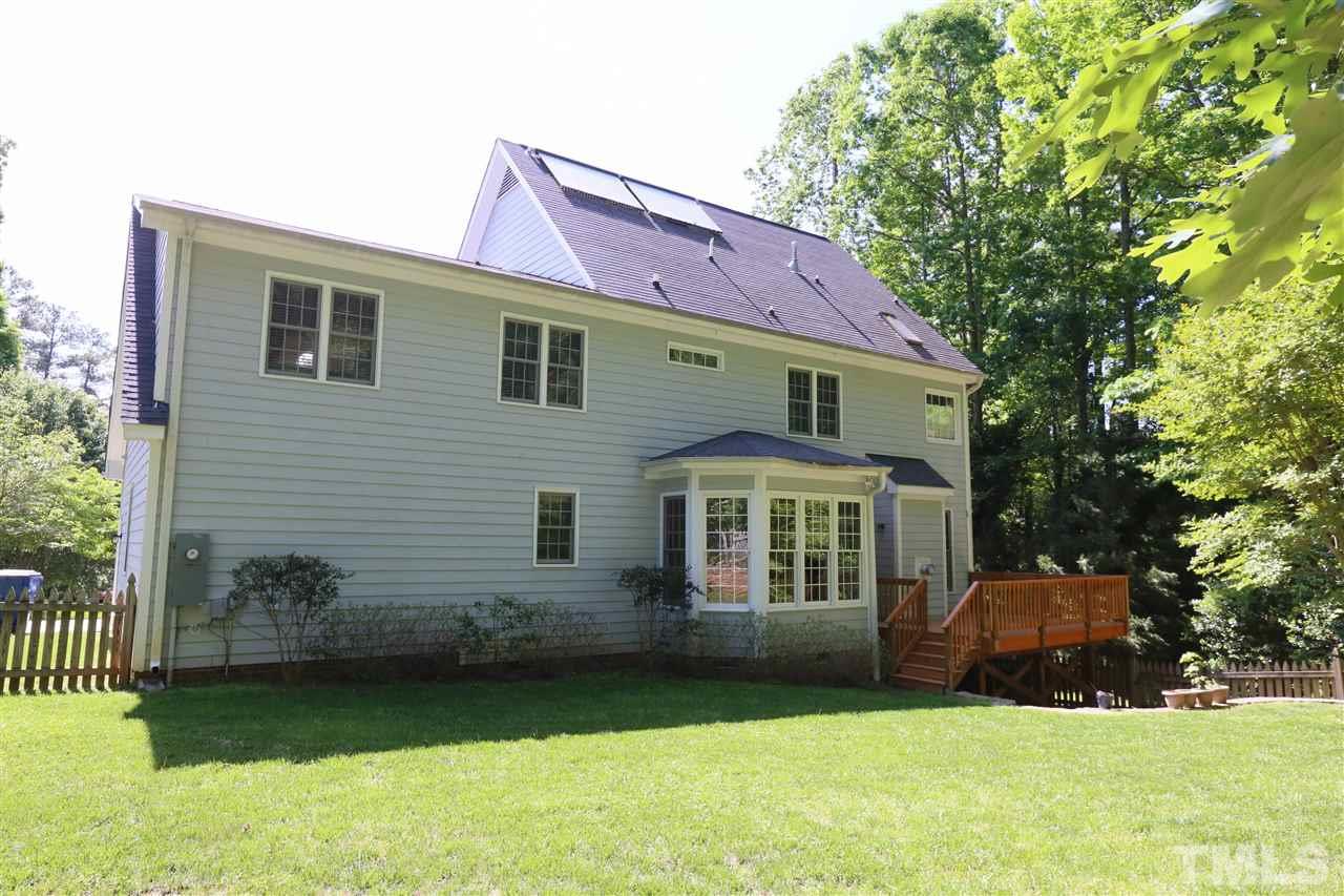 6729 Hammersmith Drive Raleigh, NC 27613 - Photo 21 of 21 a front view of a house with a yard