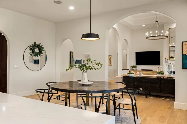a view of a livingroom with workspace and a couch