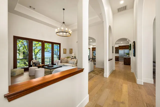 a bathroom with a sink and mirror with toilet
