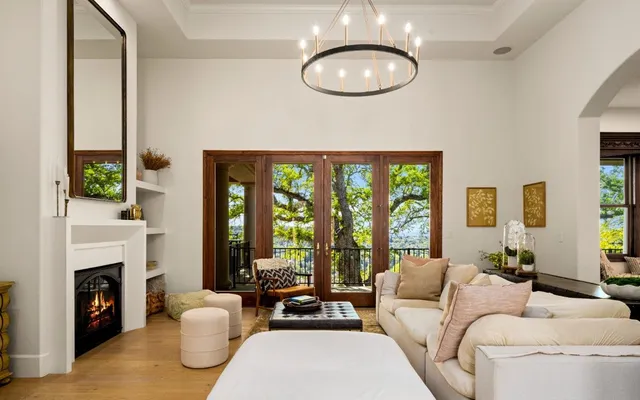 a bathroom with a granite countertop sink mirror and a shower