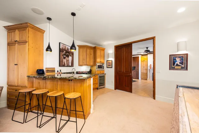a view of a patio with swimming pool and furniture